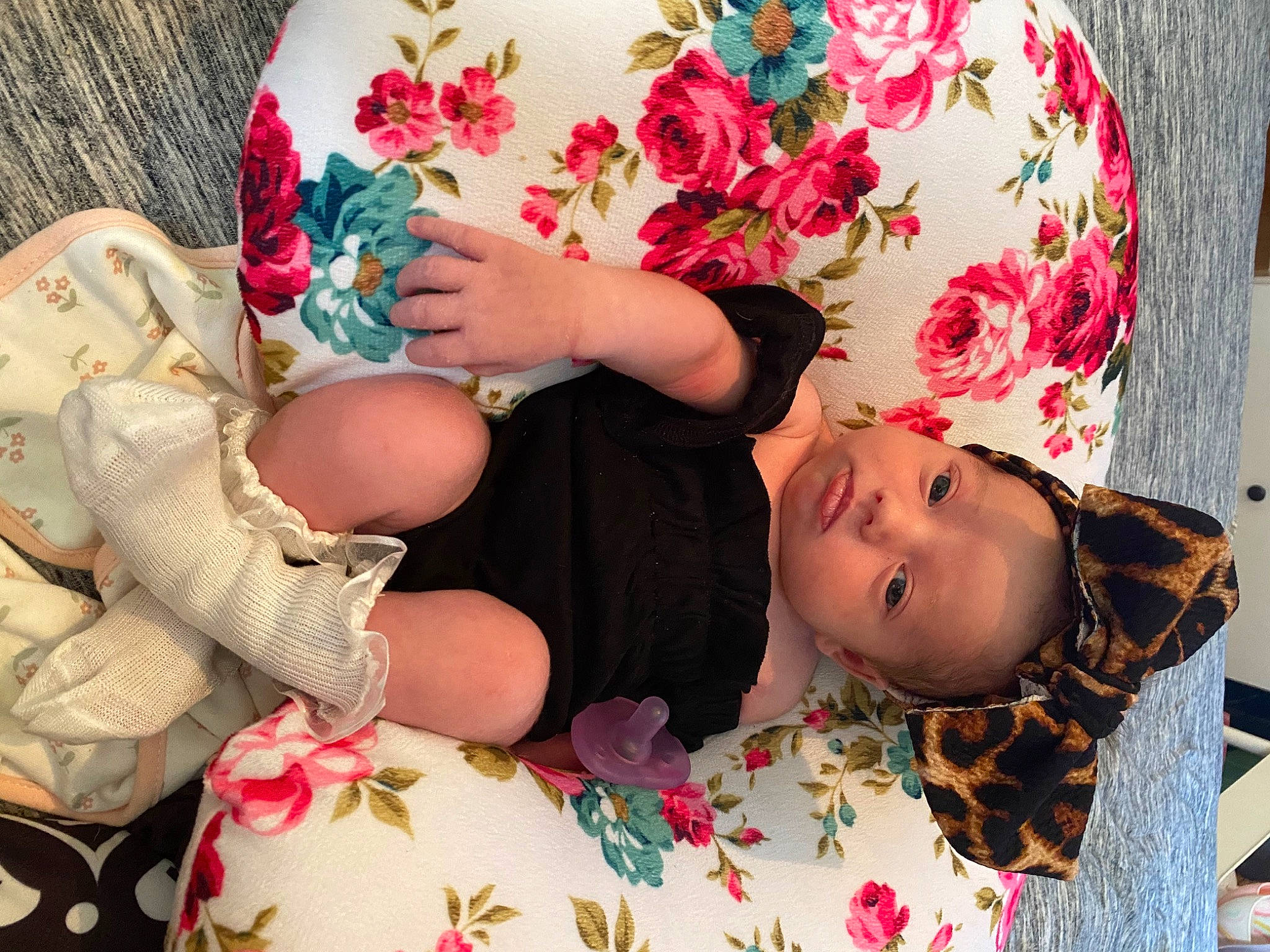 Avani is registered to the contest to win money with this photo: arm, baby, baby_toddler_clothing, beauty, child, eye, flower, hand, happy, head, headgear, headpiece, jewellery, pattern, person, pink, plant, skin, textile, thigh