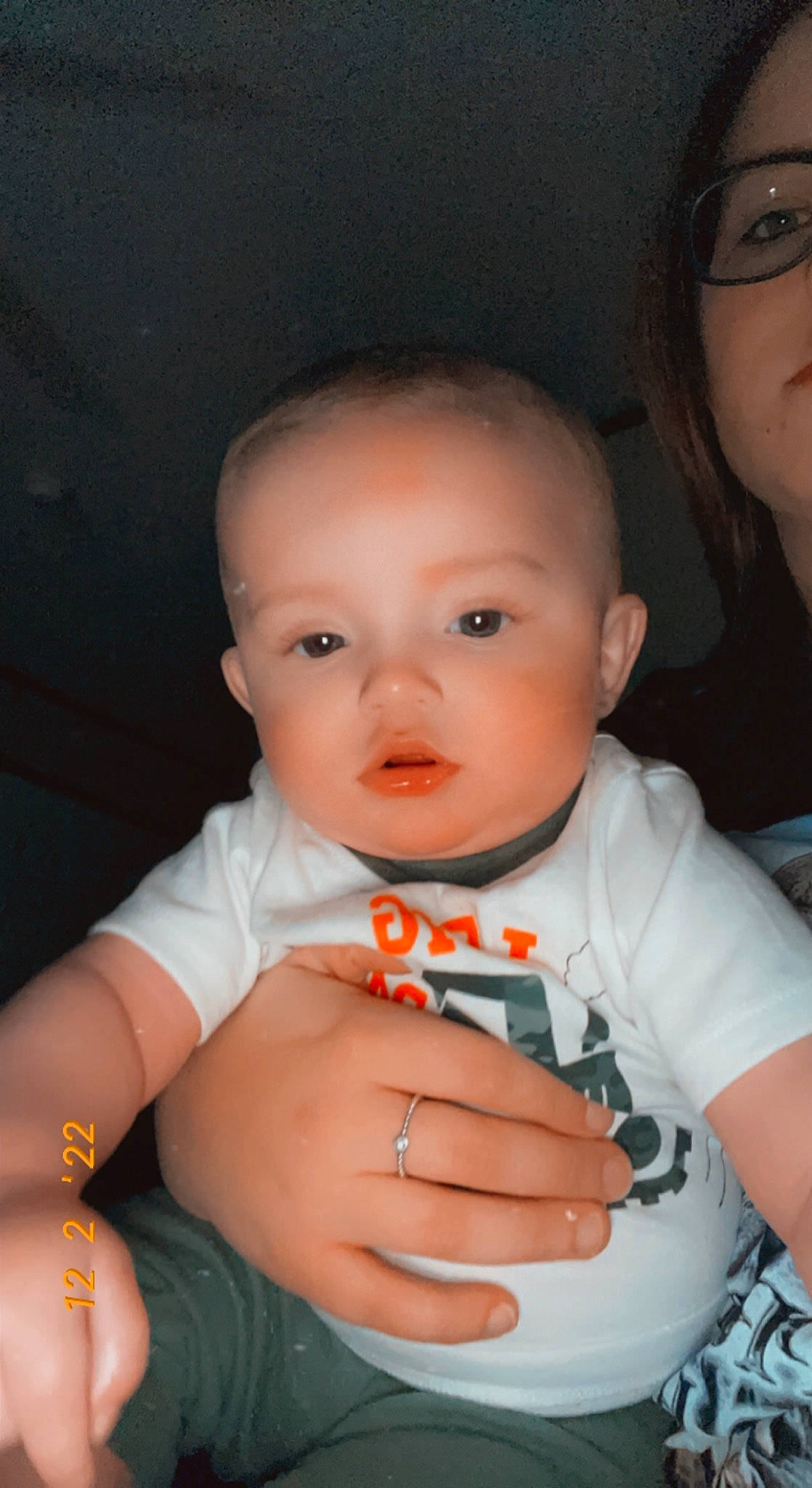 Braxtyn is registered to the contest to win money with this photo: arm, baby_toddler_clothing, cheek, chin, eye, eyebrow, face, flash_photography, forehead, hand, head, iris, lip, mouth, neck, nose, organ, person, skin, sleeve
