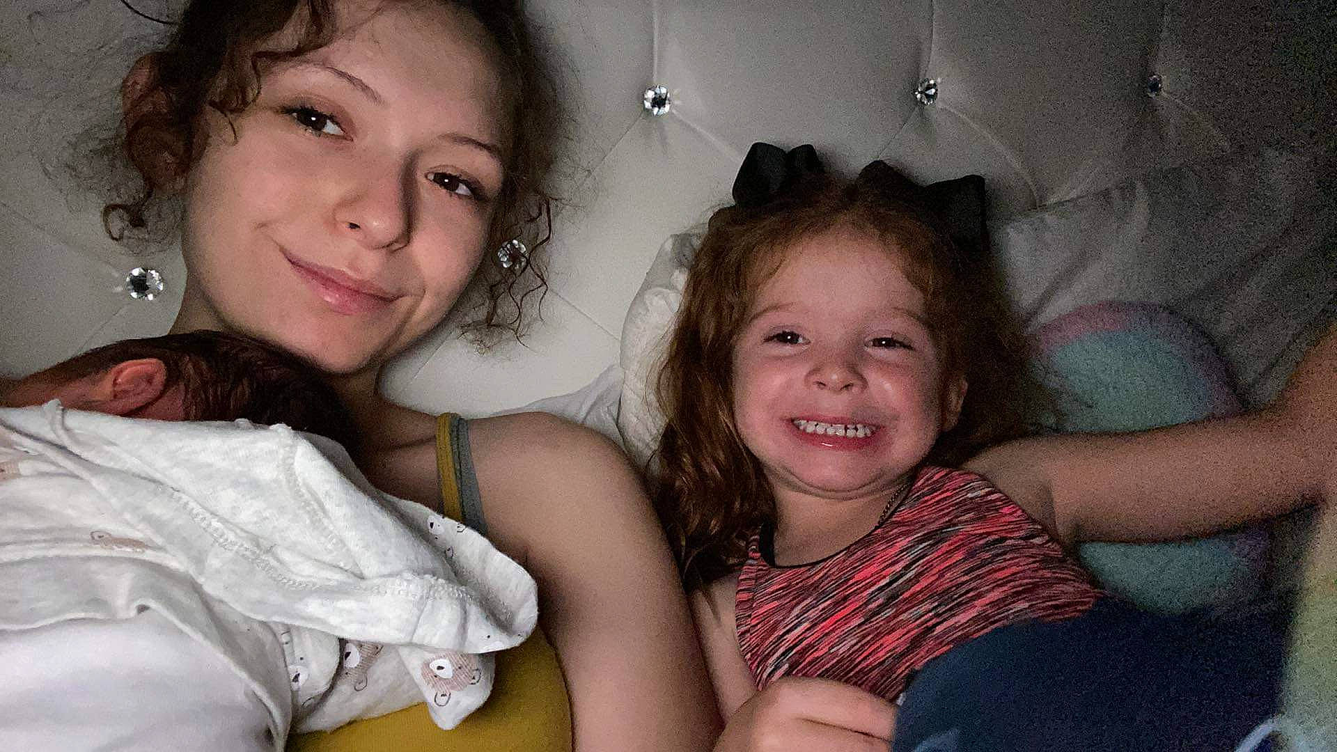 Malia is registered to the contest to win money with this photo: cheek, child, chin, eye, eyelash, face, flash_photography, friendship, fun, gesture, hair, happy, head, human, iris, joy, nose, organ, people, person