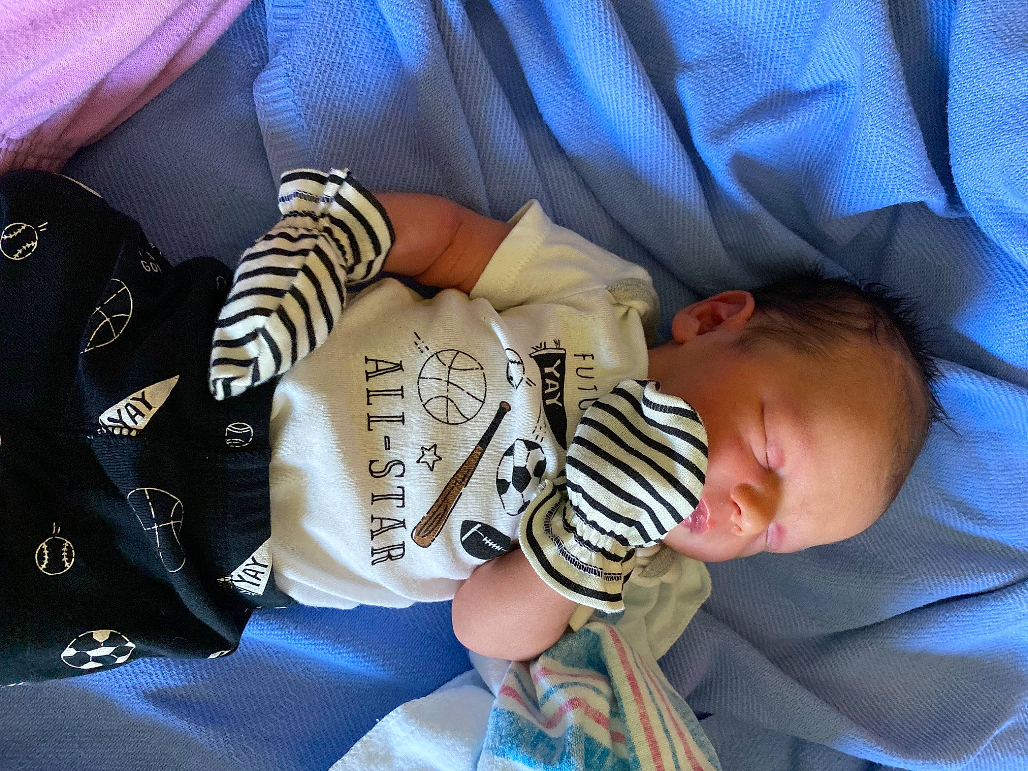 Dakota joined the competition — help win amazing prizes! baby, baby_products, baby_sleeping, baby_toddler_clothing, child, comfort, cool, electric_blue, eyewear, fashion_accessory, happy, linens, nail, nap, pattern, person, room, sitting, sleeve, thigh