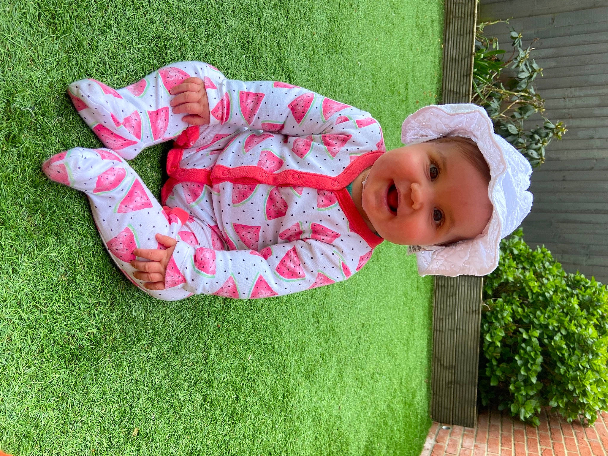 Darcie joined the competition — help win amazing prizes! baby_toddler_clothing, botany, dress, grass, grass_family, green, groundcover, happy, hat, headwear, human_body, lawn, leaf, leisure, meadow, people_in_nature, person, plant, smile, sun_hat