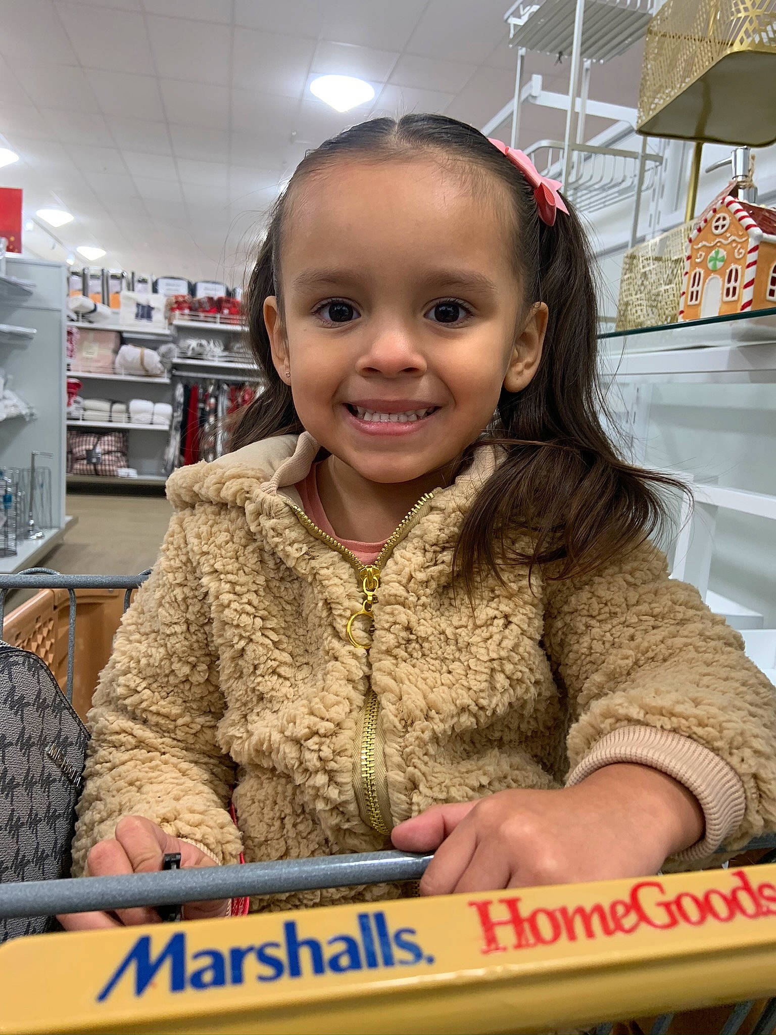 Hayley is registered to the contest to win money with this photo: baby, child, customer, fun, happy, joy, learning, person, play, recreation, retail, room, sitting, smile, t_shirt, toddler, toy