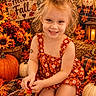 Paisley joined the competition — help win amazing prizes! child, girl, smiling, portrait, autumn, fall, pumpkins, sunflowers, flowers, leaves, harvest, hay_bale, dress, hair_bow, red_dress, kneeling, indoors, seasonal_decor, candle, scarecrow