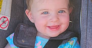 Isabella joined the competition — help win amazing prizes! baby, child, smiling, car_seat, blue_eyes, hair_tuft, straps, clothing, infant, happiness, portrait, seatbelt, cute, safety, colorful, toddler, closeup, person, seat, happy