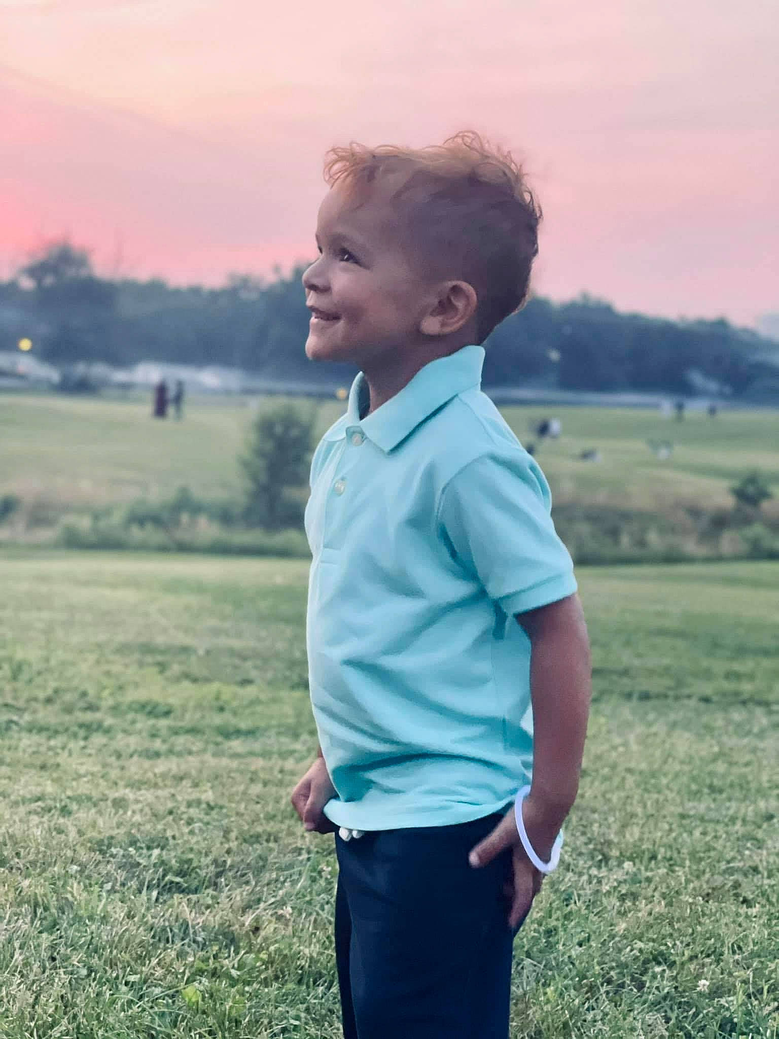 Xaiden joined the competition — help win amazing prizes! flash_photography, fun, gesture, grass, grassland, happy, joy, landscape, leisure, meadow, morning, people_in_nature, person, plain, plant, prairie, sky, sleeve, smile, standing
