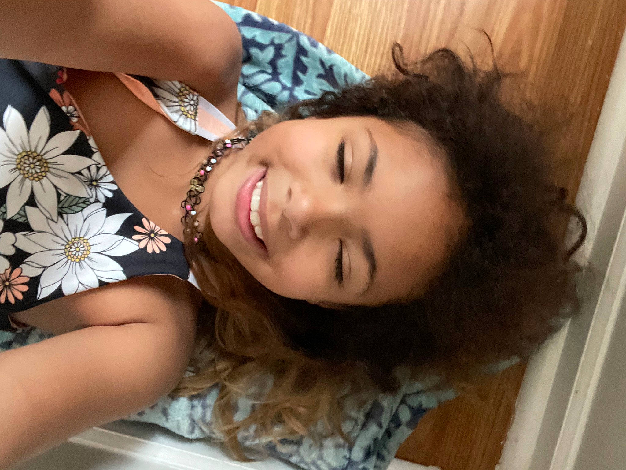 Robin is registered to the contest to win money with this photo: beauty, black_hair, dress, eyelash, flash_photography, flower, gesture, happy, human_body, jaw, jewellery, joy, lip, long_hair, neck, person, petal, plant, skin, smile