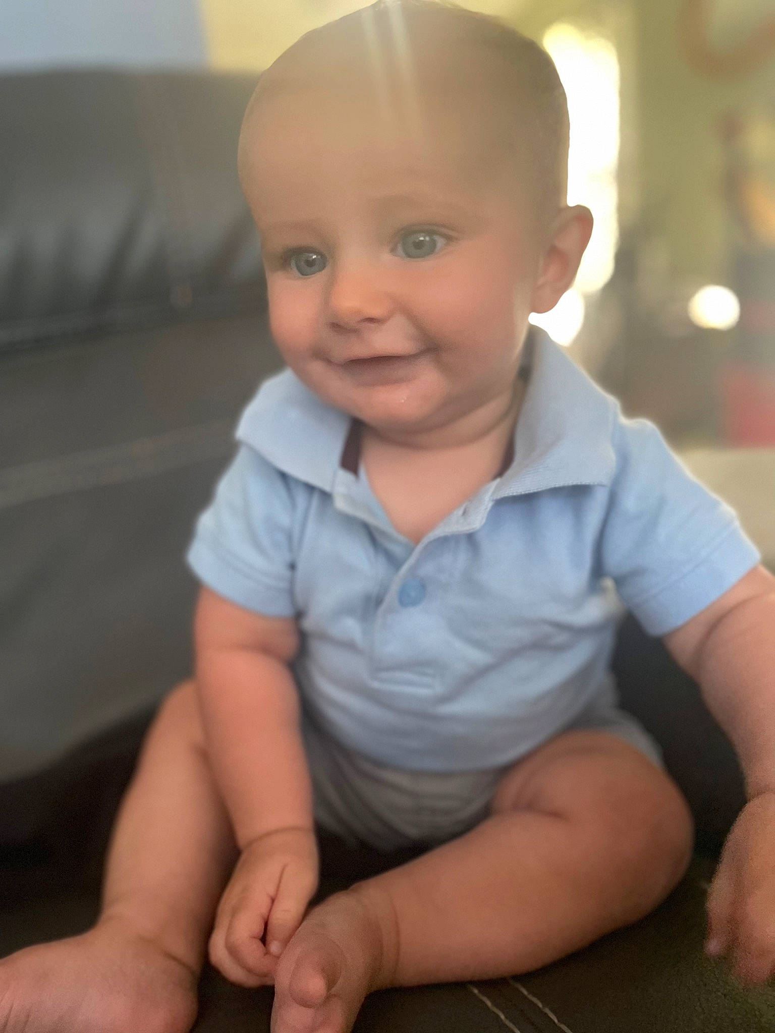 Colton is registered to the contest to win money with this photo: baby, baby_toddler_clothing, cheek, chin, eye, finger, floor, flooring, gesture, happy, iris, joint, joy, lip, mouth, nose, person, shoulder, skin, sleeve