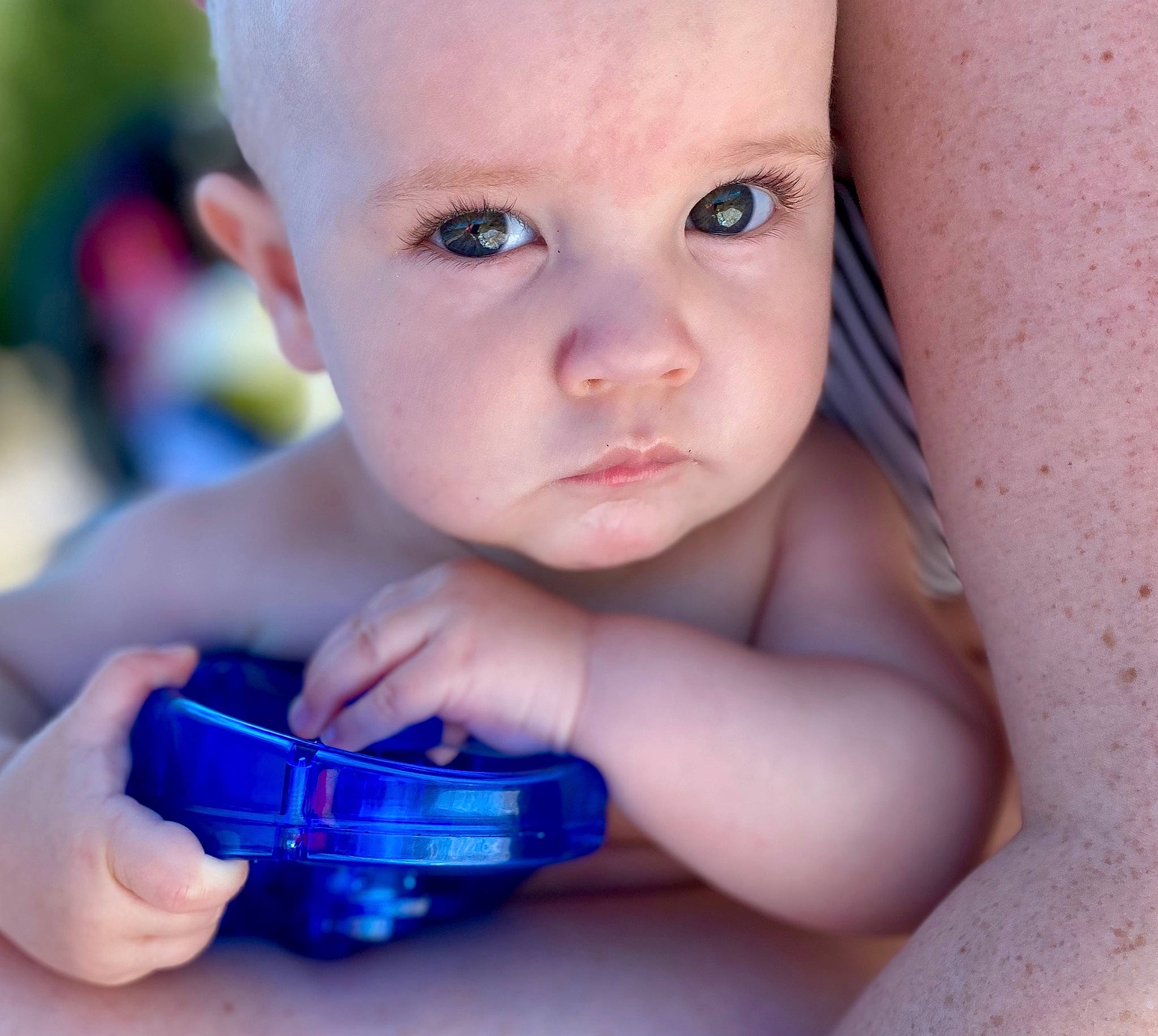 Lincoln is registered to the contest to win money with this photo: baby, baby_products, blue, cheek, child, drinkware, ear, eye, face, finger, hand, head, lip, mouth, nose, person, product, skin, smile, toddler