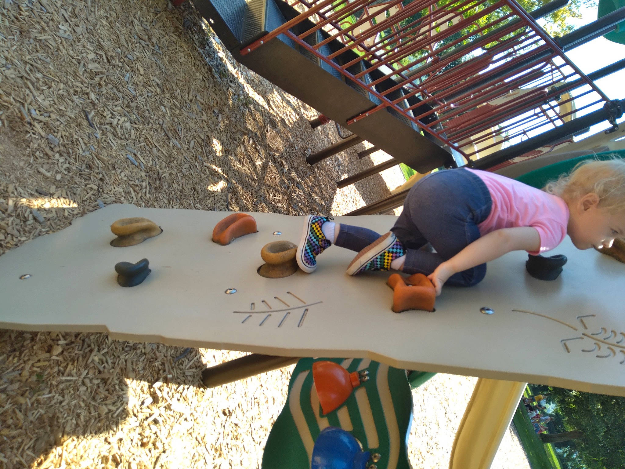 Araya is registered to the contest to win money with this photo: child, city, concrete, fun, grass, leisure, paint, pattern, person, play, public_space, recreation, shade, shorts, soil, t_shirt, thigh, vacation, visual_arts, wood