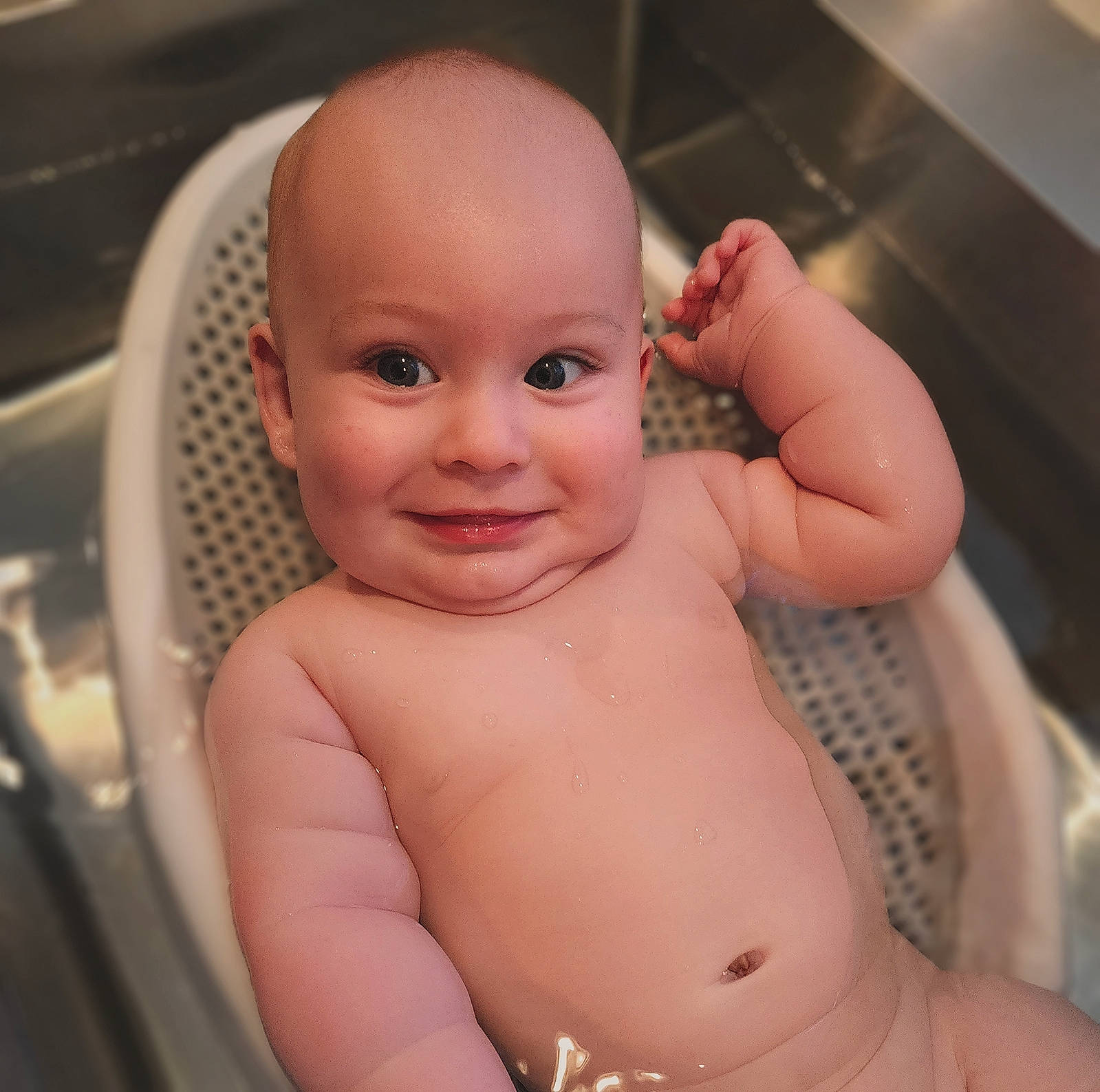 Casen is registered to the contest to win money with this photo: arm, baby_bathing, cheek, ear, eye, eyelash, finger, hairstyle, hand, human_body, joint, joy, lip, mouth, muscle, neck, nose, organ, person, skin
