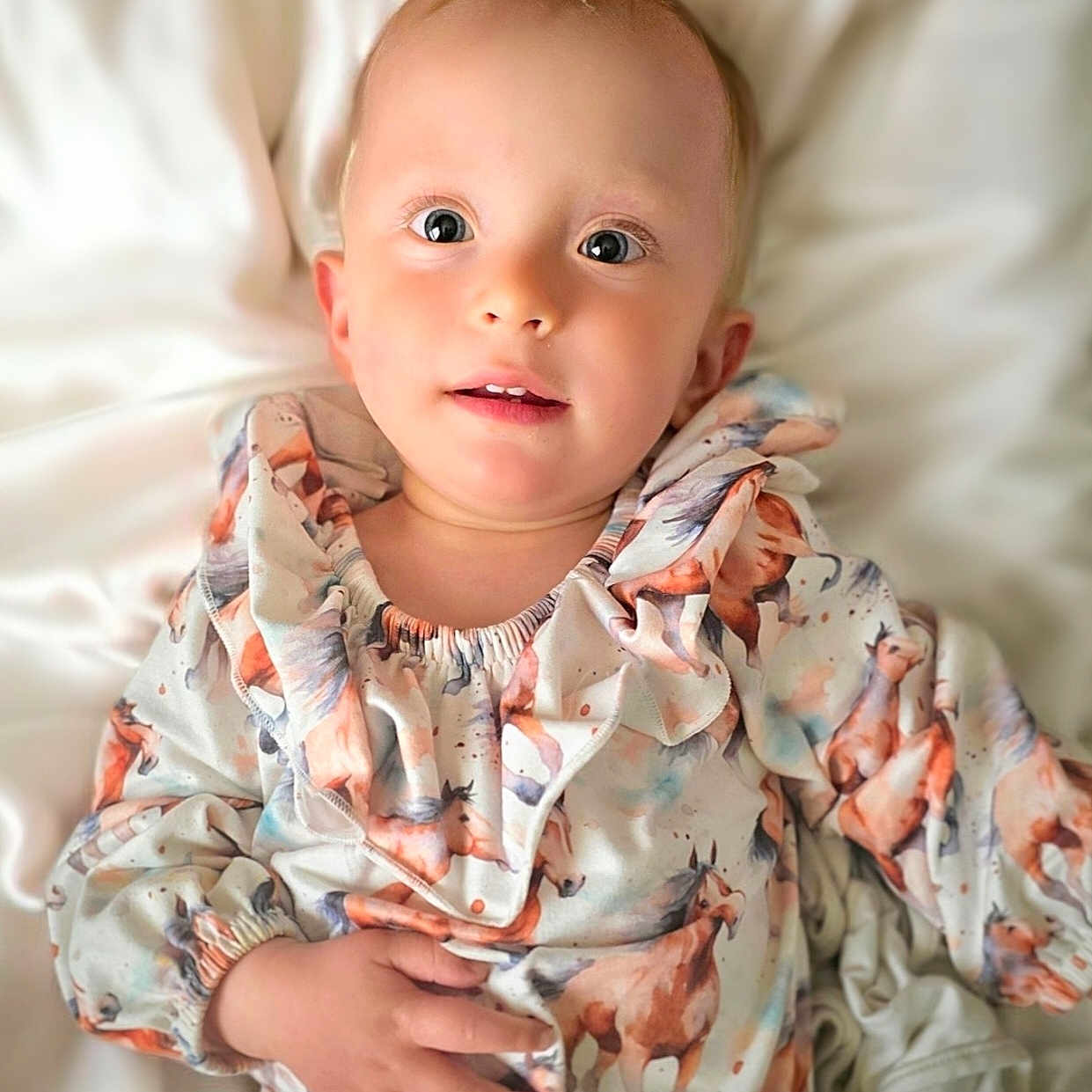 Goldie joined the competition — help win amazing prizes! baby, babylaughing, beachwear, blanket, blonde, bodypart, clothing, dress, face, hair, happy, head, newborn, person, photography, portrait, quilt, shoulder, sleeve, smile