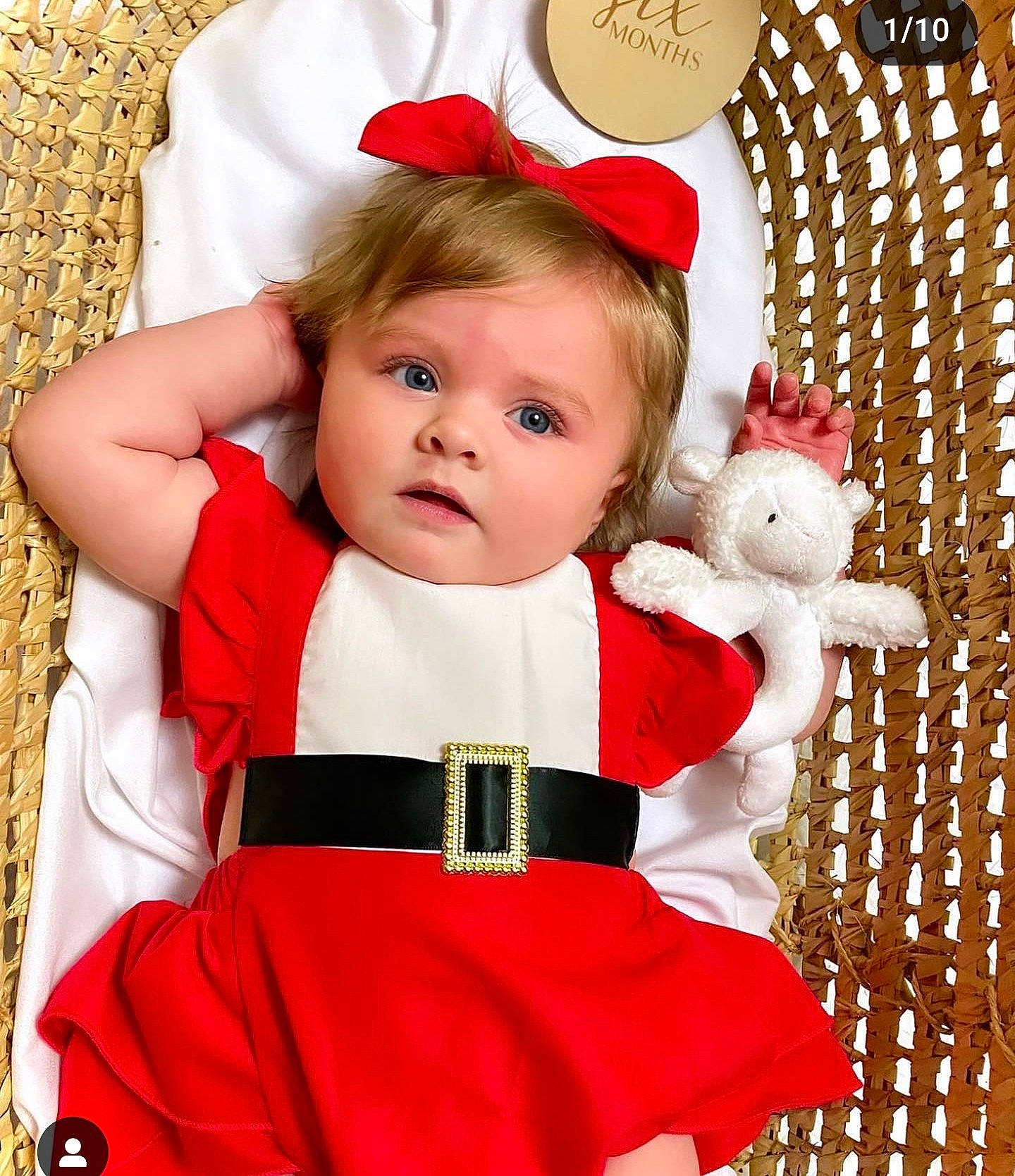 Kiley joined the competition — help win amazing prizes! baby, baby_toddler_clothing, carmine, child, christmas_ornament, costume_hat, event, fictional_character, formal_wear, happy, head, holiday, human_body, ornament, pattern, person, pink, red, sleeve, toddler