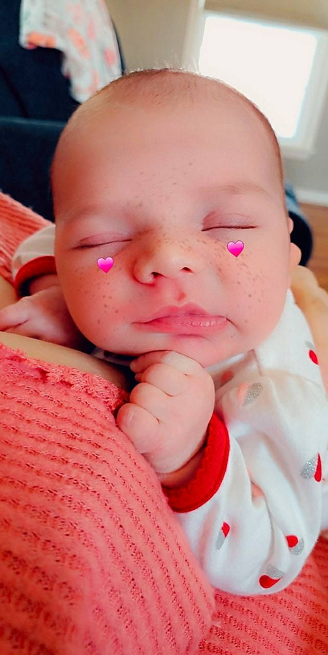 Holly is registered to the contest to win money with this photo: baby, cheek, child, chin, close_up, ear, eye, face, forehead, head, lip, mouth, nose, person, pink, skin, toddler