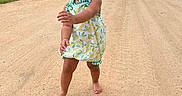 Kaizlee joined the competition — help win amazing prizes! toddler, child, smiling, barefoot, dress, green_bow, dirt_road, outdoor, nature, grass, cloudy_sky, walking, happy, portrait, summer, field, rural, person, cute, young_child