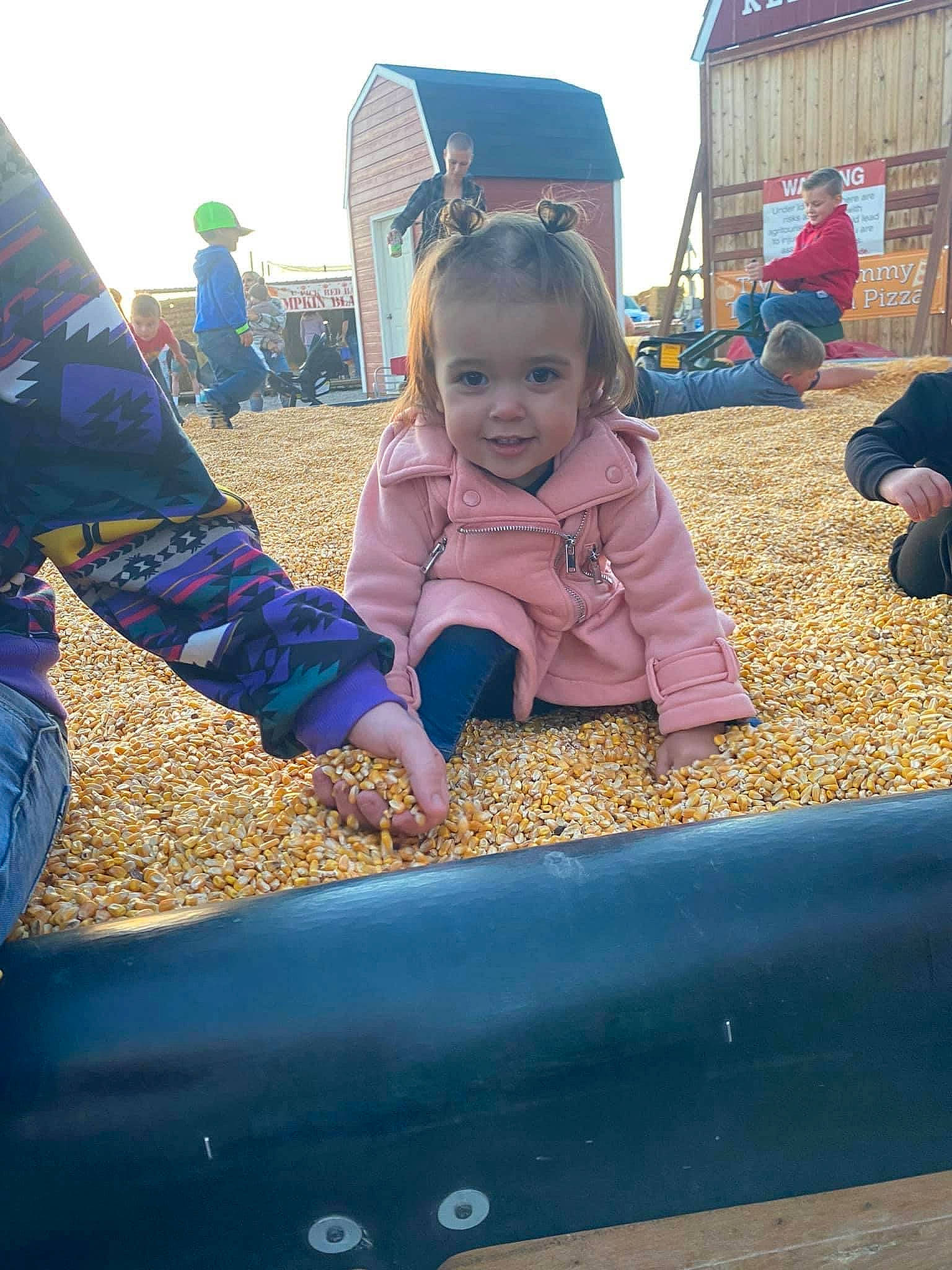 Laikyn is registered to the contest to win money with this photo: baby, child, city, electric_blue, event, fun, grass, happy, leaf, leisure, outdoor_play_equipment, person, play, playground, recreation, sitting, sky, soil, toddler, vacation