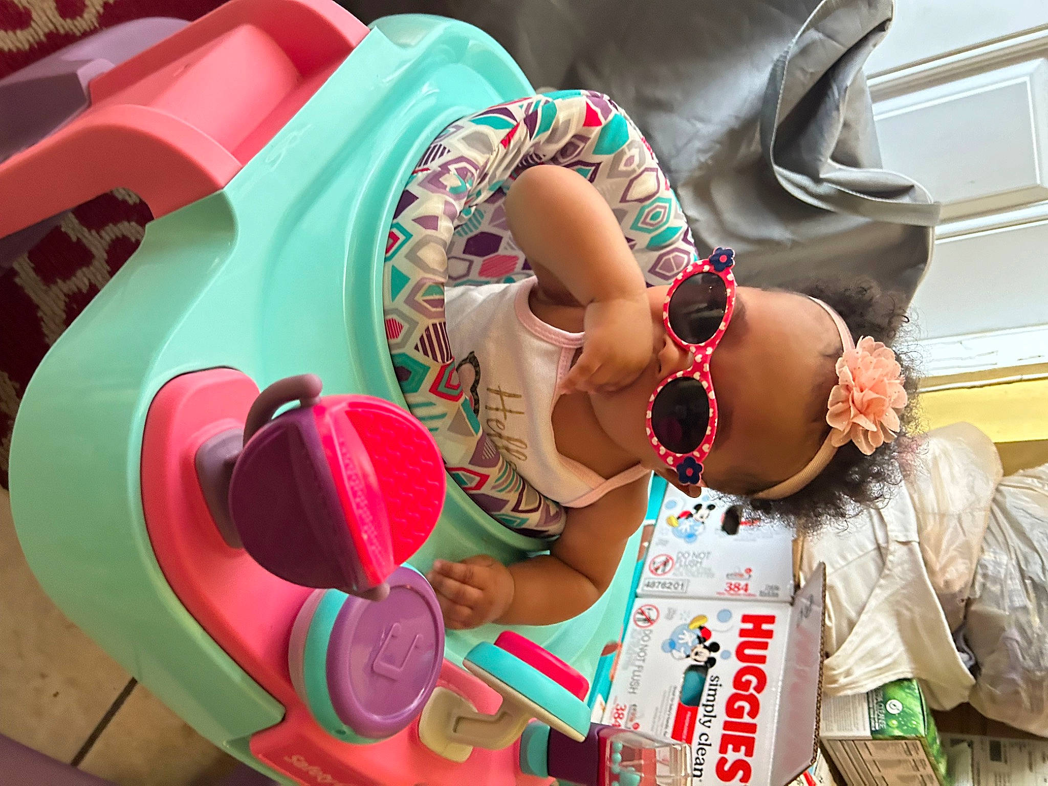 Valentina is registered to the contest to win money with this photo: automotive_wheel_system, carmine, child, event, eyewear, fashion_accessory, festival, fun, goggles, happy, leisure, magenta, pattern, person, pink, recreation, sunglasses, toy, tradition, vacation