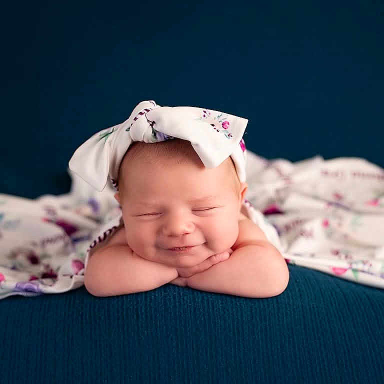 Athena joined the competition — help win amazing prizes! baby, babylaughing, blanket, bonnet, clothing, crying, cushion, face, happy, hat, head, homedecor, newborn, person, photography, portrait, sad, sleeping, smile
