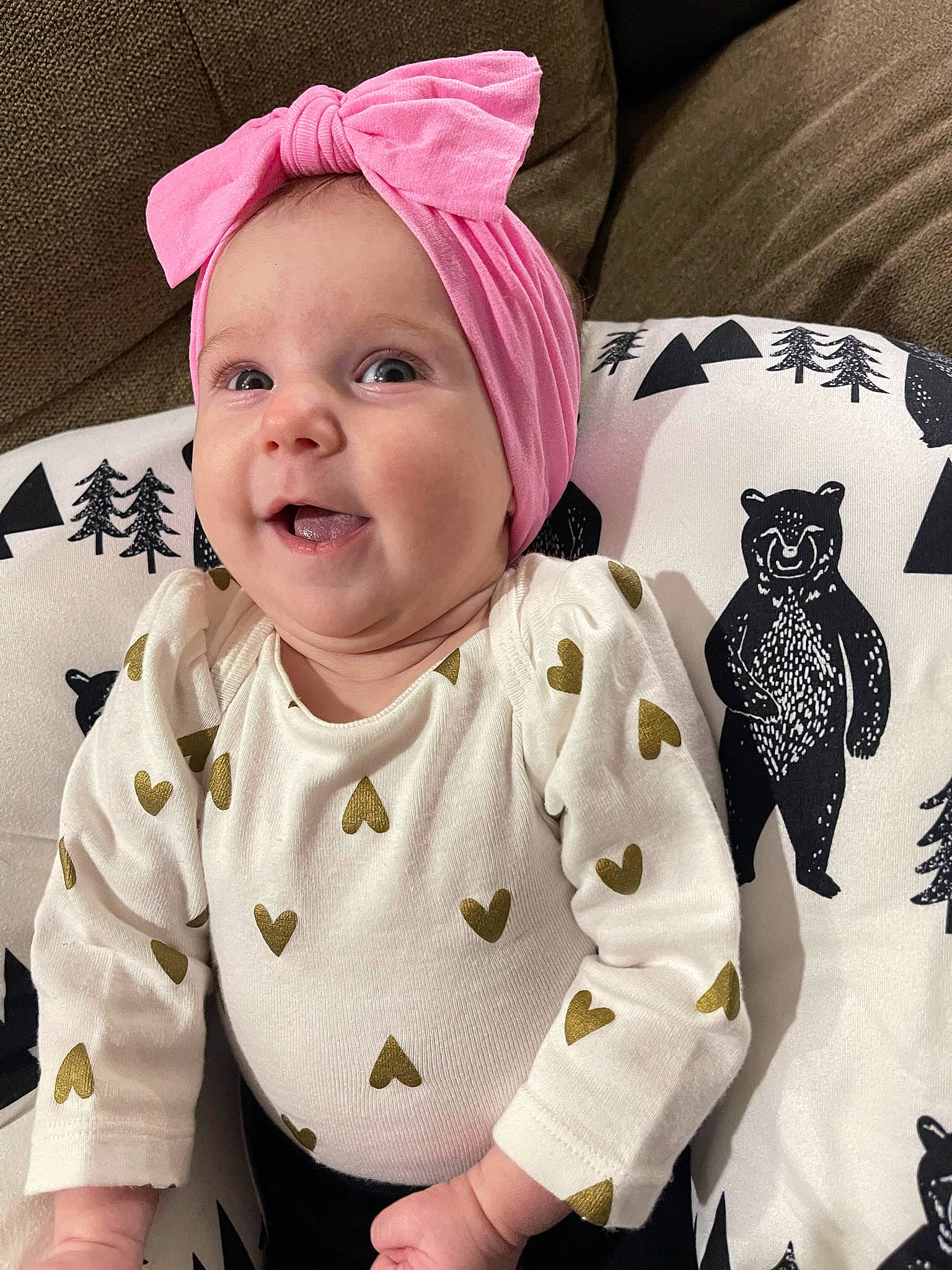 Olivia joined the competition — help win amazing prizes! baby, baby_laughing, baby_toddler_clothing, cap, cool, costume_hat, fashion_accessory, happy, headwear, human, mammal, owl, pattern, person, pink, product, sleeve, smile, t_shirt, textile