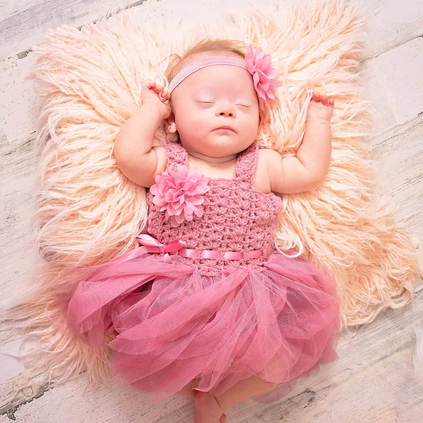 Saraya joined the competition — help win amazing prizes! abdomen, arm, baby, baby_toddler_clothing, comfort, dress, eye, face, hair, happy, head, headgear, headpiece, headwear, human_body, iris, leg, magenta, person, pink