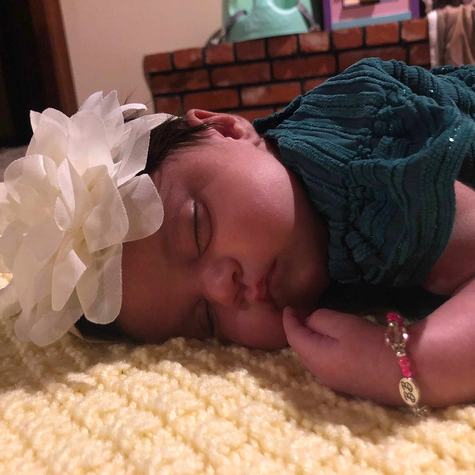 Marceline is registered to the contest to win money with this photo: baby, black_hair, child, hand, mouth, nap, neck, sleep