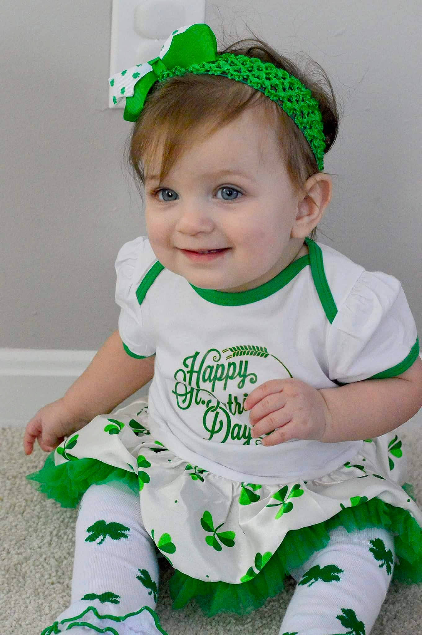 Arwen joined the competition — help win amazing prizes! baby, baby_bloomers, baby_products, baby_toddler_clothing, child, costume, costume_accessory, fashion_accessory, fictional_character, green, hair_accessory, headband, headgear, holiday, joy, person, product, saint_patricks_day, sleeve, smile