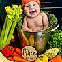 Parker joined the competition — help win amazing prizes! baby, infant, pumpkin_hat, metal_pot, vegetables, carrots, bell_pepper, corn, celery, lettuce, gourd, smiling, happy, milestone, three_months, wooden_sign, orange, yellow, green, cute
