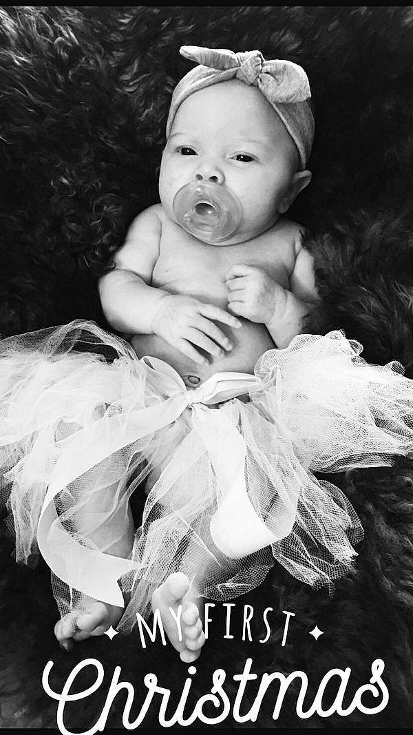Lexie Lynn is registered to the contest to win money with this photo: black_and_white, child, girl, hair_accessory, happiness, infant, monochrome, monochrome_photography, person, photograph, photography, portrait_photography, smile, stock_photography, toddler