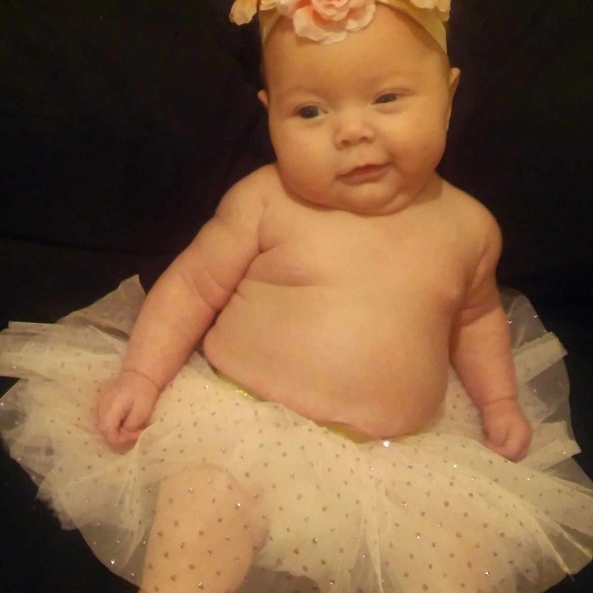 Lexie Lynn is registered to the contest to win money with this photo: child, figurine, hair_accessory, headgear, headpiece, infant, person, toddler