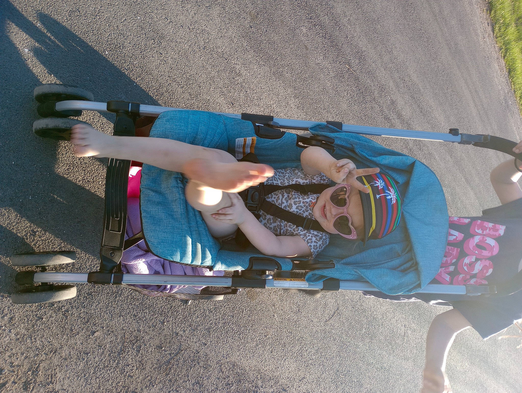 Annie Oaklee joined the competition — help win amazing prizes! ankle, auto_part, automotive_exterior, automotive_tire, automotive_wheel_system, baby_products, bumper, electric_blue, fun, human_leg, knee, leg, leisure, person, recreation, shadow, smile, thigh, tire, vehicle