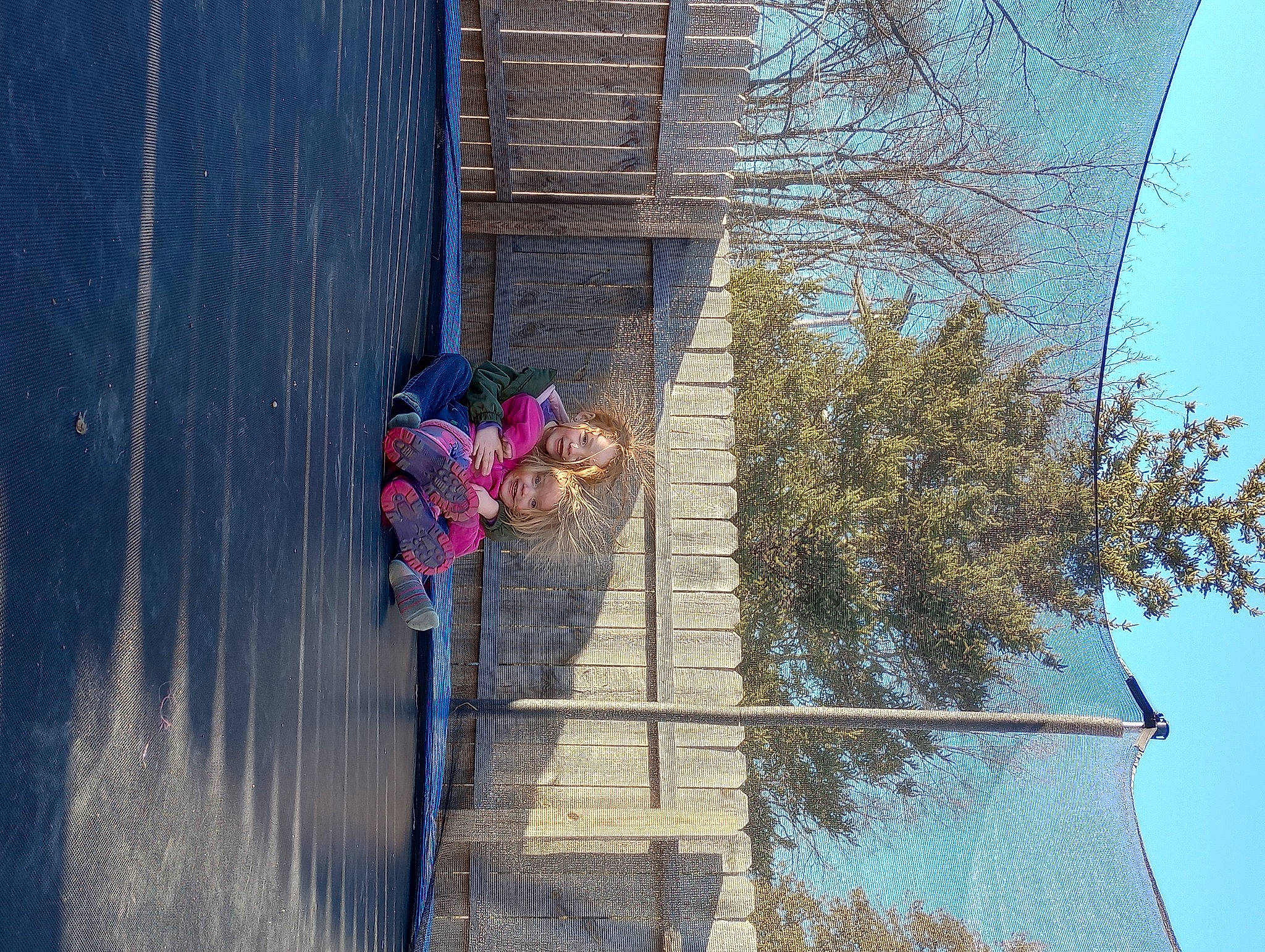 Amberlynn joined the competition — help win amazing prizes! azure, branch, building, electric_blue, electricity, facade, house, joy, leisure, line, person, plant, public_utility, recreation, reflection, sky, slope, tree, twig, window