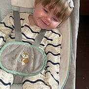 Gracie-Mae joined the competition — help win amazing prizes! baby, baby_seat, bangs, bouncer, bow, child, cozy, embroidered_fox, hair, harness, headband, indoor, infant, knitwear, portrait, rosy_cheeks, smiling, stripes, sweater, wooden_floor