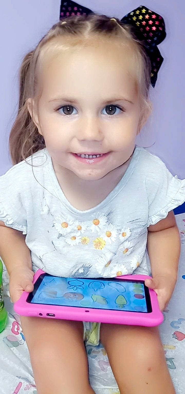 Everleigh joined the competition — help win amazing prizes! baby_playing_with_toys, baby_toddler_clothing, cheek, child, communication_device, eyelash, facial_expression, fun, gadget, happy, iris, joy, nose, person, photograph, pink, product, skin, sleeve, smile