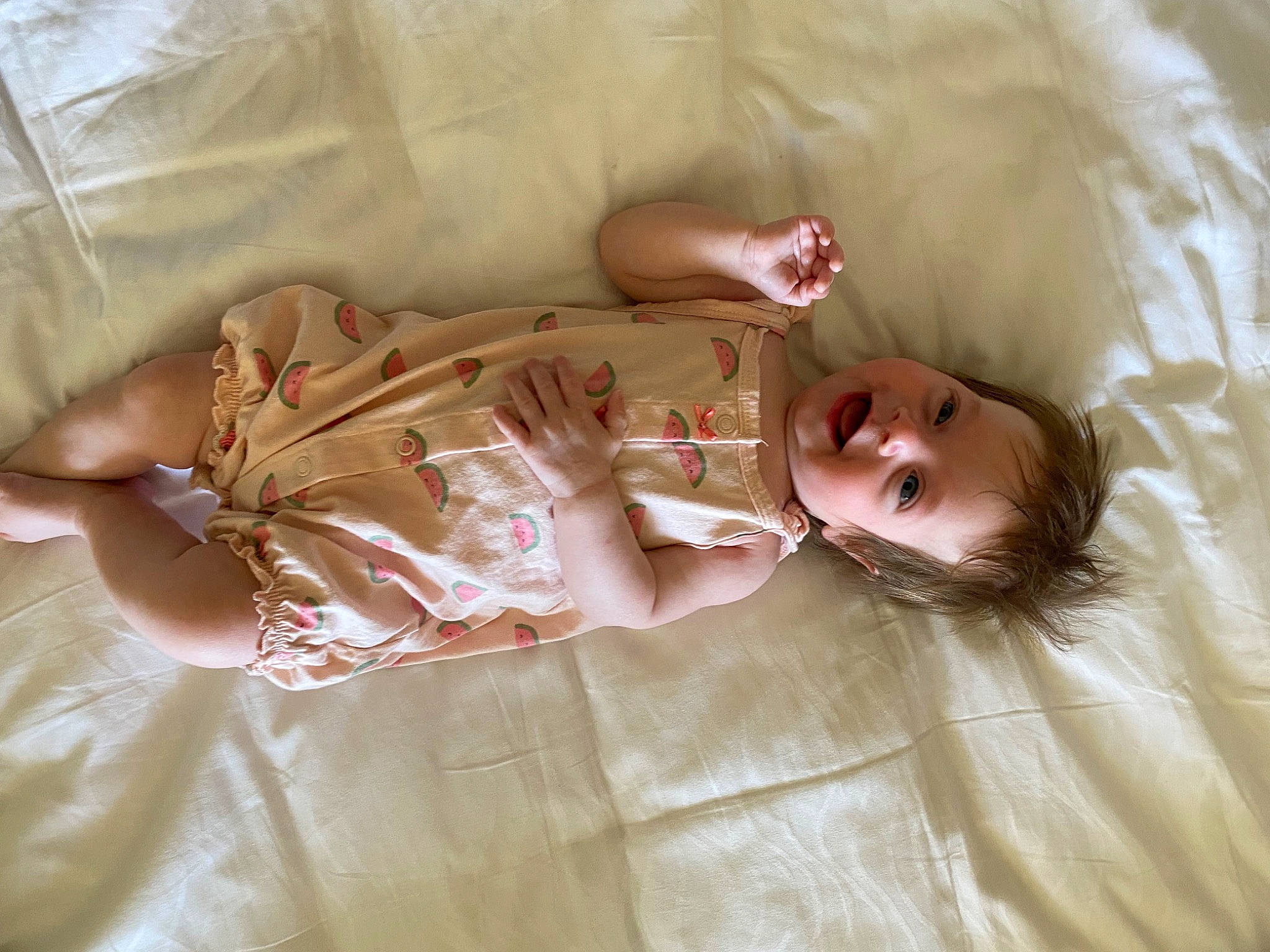Tuana is registered to the contest to win money with this photo: abdomen, baby, baby_toddler_clothing, bed, bed_sheet, bedding, bedtime, child, comfort, day_dress, dress, fawn, flooring, fur, happy, human_body, human_leg, joy, linens, person