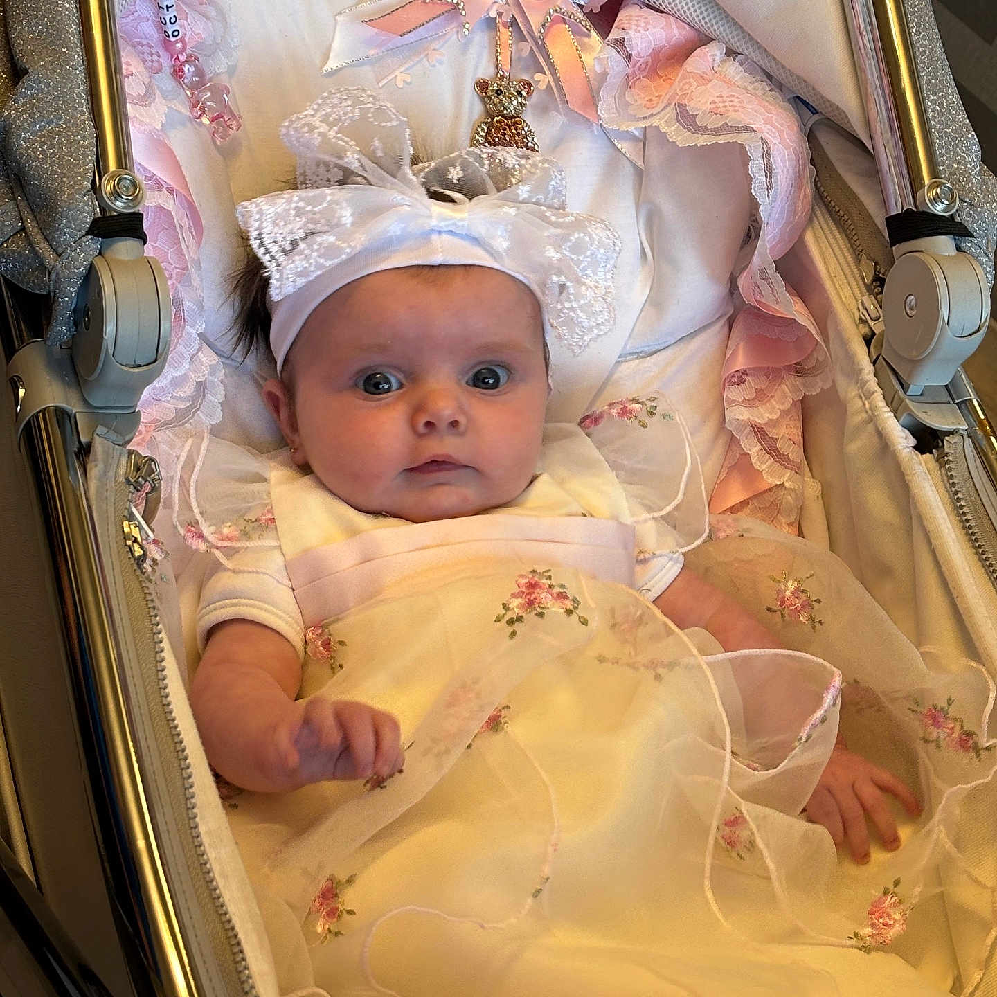 Octavia is registered to the contest to win money with this photo: accessories, baby, bed, bonnet, cap, clothing, cradle, crib, dress, face, furniture, hat, head, infantbed, jewelry, newborn, person, photography, portrait, stroller