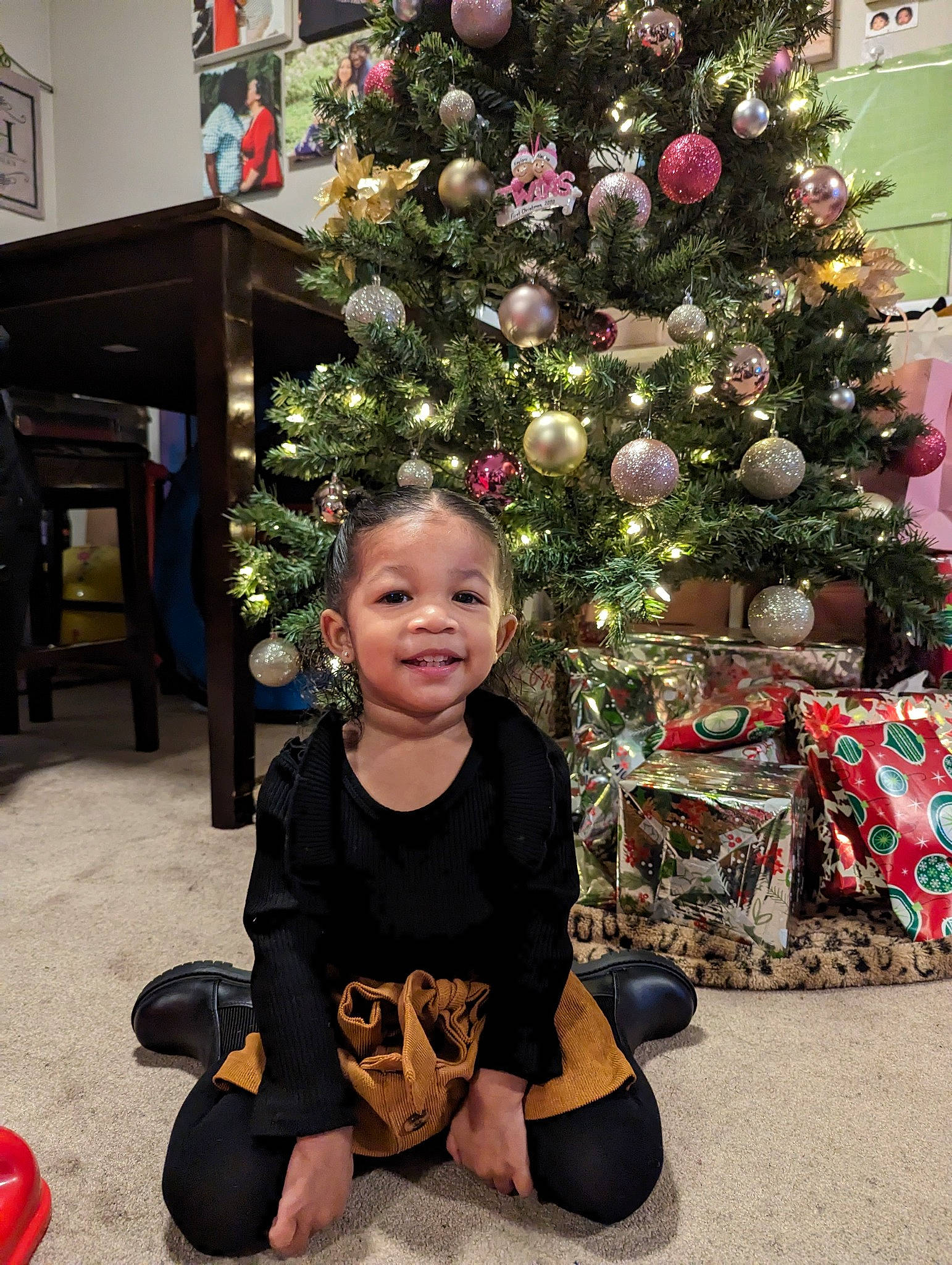 Kaylani is registered to the contest to win money with this photo: christmas, christmas_decoration, christmas_ornament, christmas_tree, event, flooring, fun, happy, holiday, holiday_ornament, joy, ornament, people, person, photograph, plant, public_space, smile, snapshot, standing