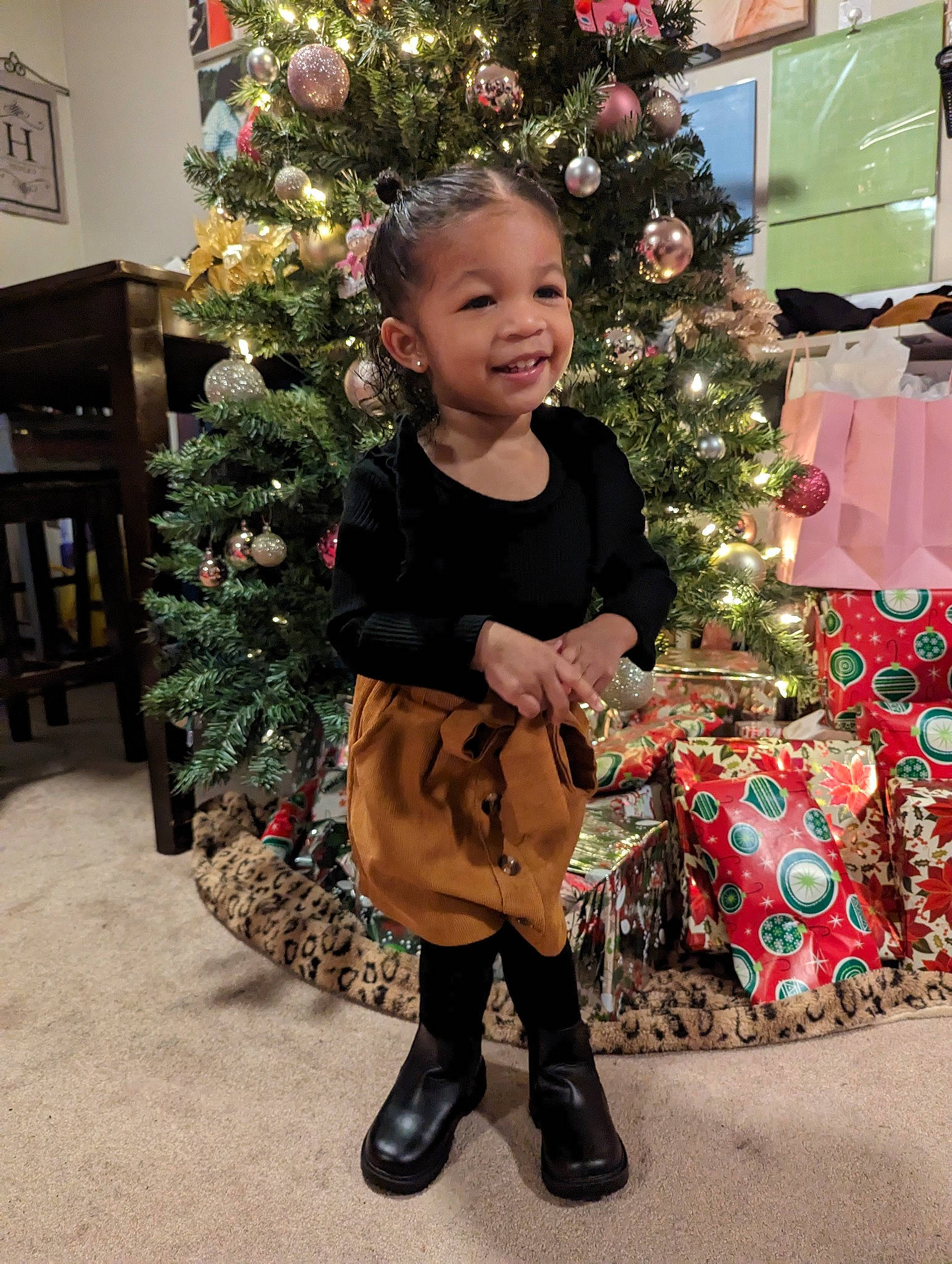 Kaylani joined the competition — help win amazing prizes! baby_toddler_clothing, beauty, christmas, christmas_decoration, christmas_eve, christmas_ornament, christmas_tree, event, happy, holiday, holiday_ornament, human_body, joy, ornament, person, plant, sleeve, smile, standing, toddler