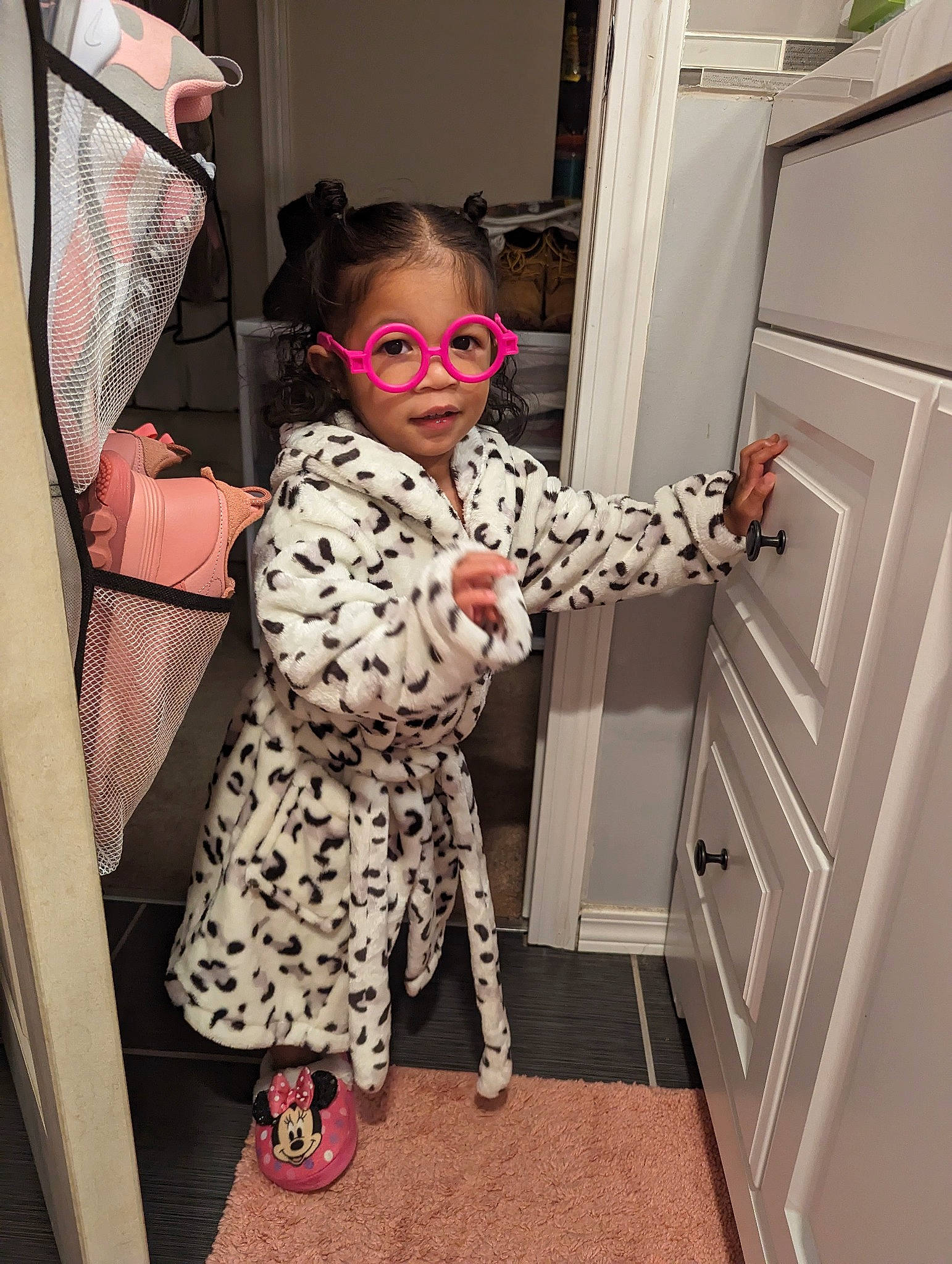 Kaylani is registered to the contest to win money with this photo: baby_toddler_clothing, child, costume, door, eyewear, fashion_design, floor, flooring, fun, hardwood, interior_design, magenta, outerwear, pattern, person, product, room, shoe, sleeve, standing