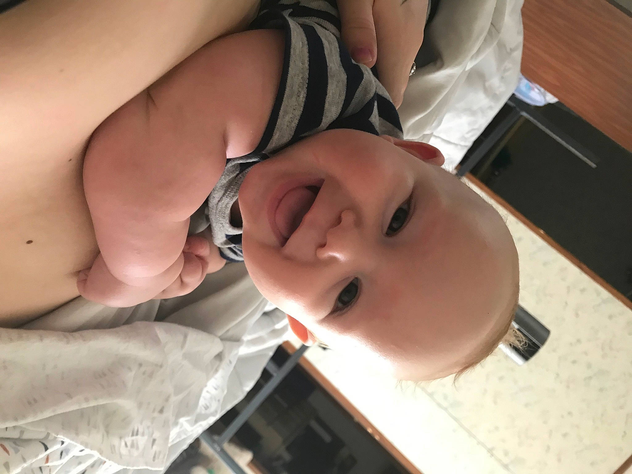 Evo is registered to the contest to win money with this photo: arm, baby, cheek, chest, comfort, elbow, eye, eyebrow, eyelash, eyewear, face, glasses, head, mouth, nail, nose, person, smile, sunglasses, toddler