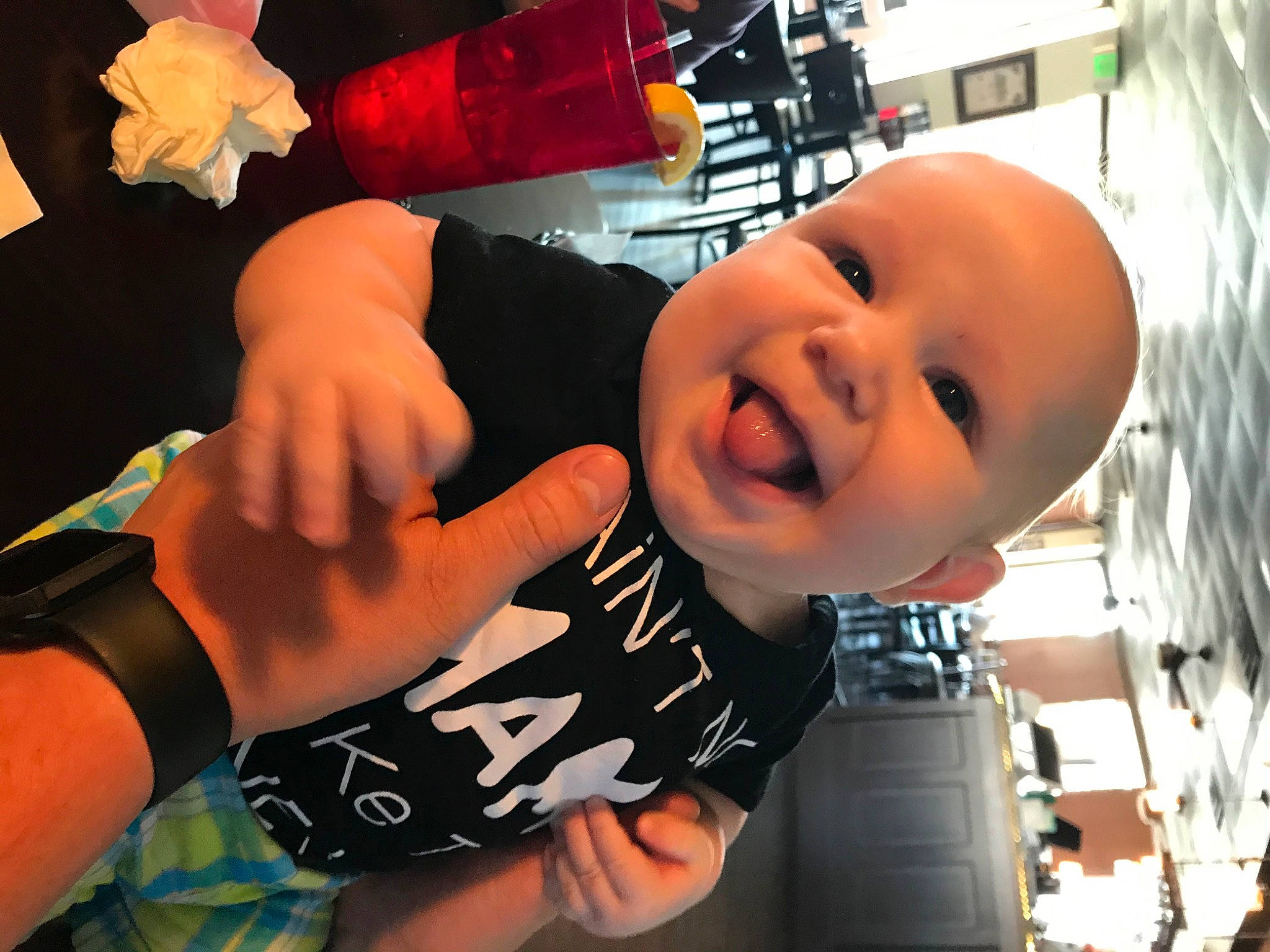 Evo is registered to the contest to win money with this photo: baby, baby_toddler_clothing, child, cool, elbow, finger, fun, gesture, hand, happy, leisure, nail, orange, person, room, sleeve, smile, t_shirt, thumb, toddler