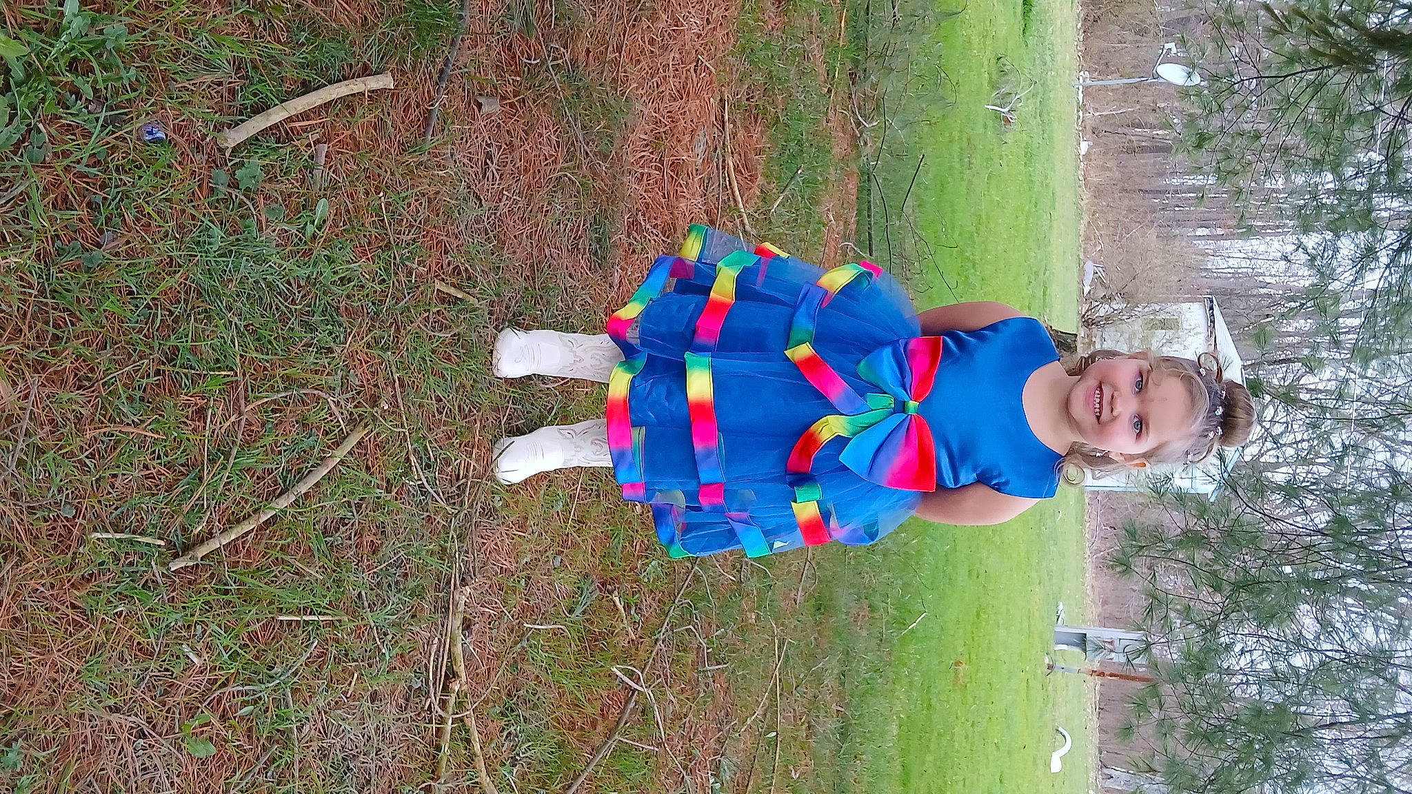 Amelia is registered to the contest to win money with this photo: baby_toddler_clothing, child, electric_blue, fun, grass, groundcover, hat, joy, leisure, people_in_nature, person, plant, smile, soil, toddler, tree, walking_shoe, woody_plant