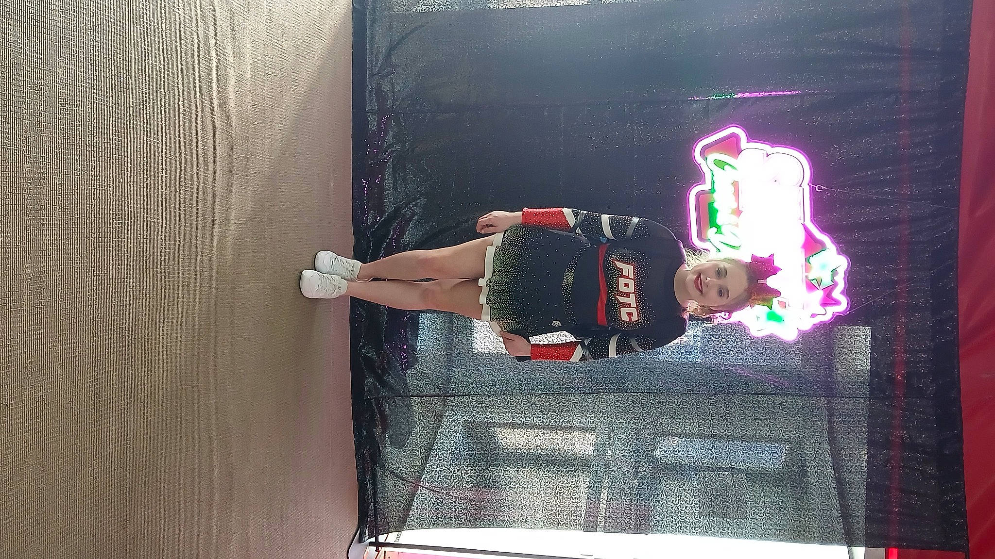 Emmah is registered to the contest to win money with this photo: display_device, door, elbow, entertainment, event, human_leg, joy, knee, magenta, performance, performing_arts, person, room, t_shirt, thigh, toddler, wrist