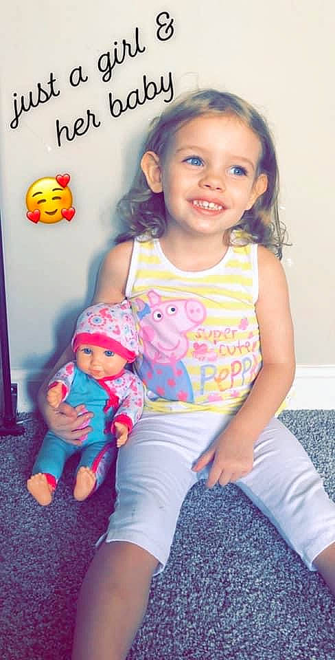 Natalee joined the competition — help win amazing prizes! arm, baby_toddler_clothing, cheek, eye, face, facial_expression, finger, gesture, hairstyle, happy, head, joy, organ, person, pink, skin, sleeve, smile, standing, thigh