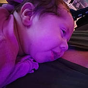 Janessa joined the competition — help win amazing prizes! baby, face, child, closeup, purple_light, resting, person, skin, clothing, cozy, comfort, young, infant, head, ear, sleepy, portrait, indoor, people, warm