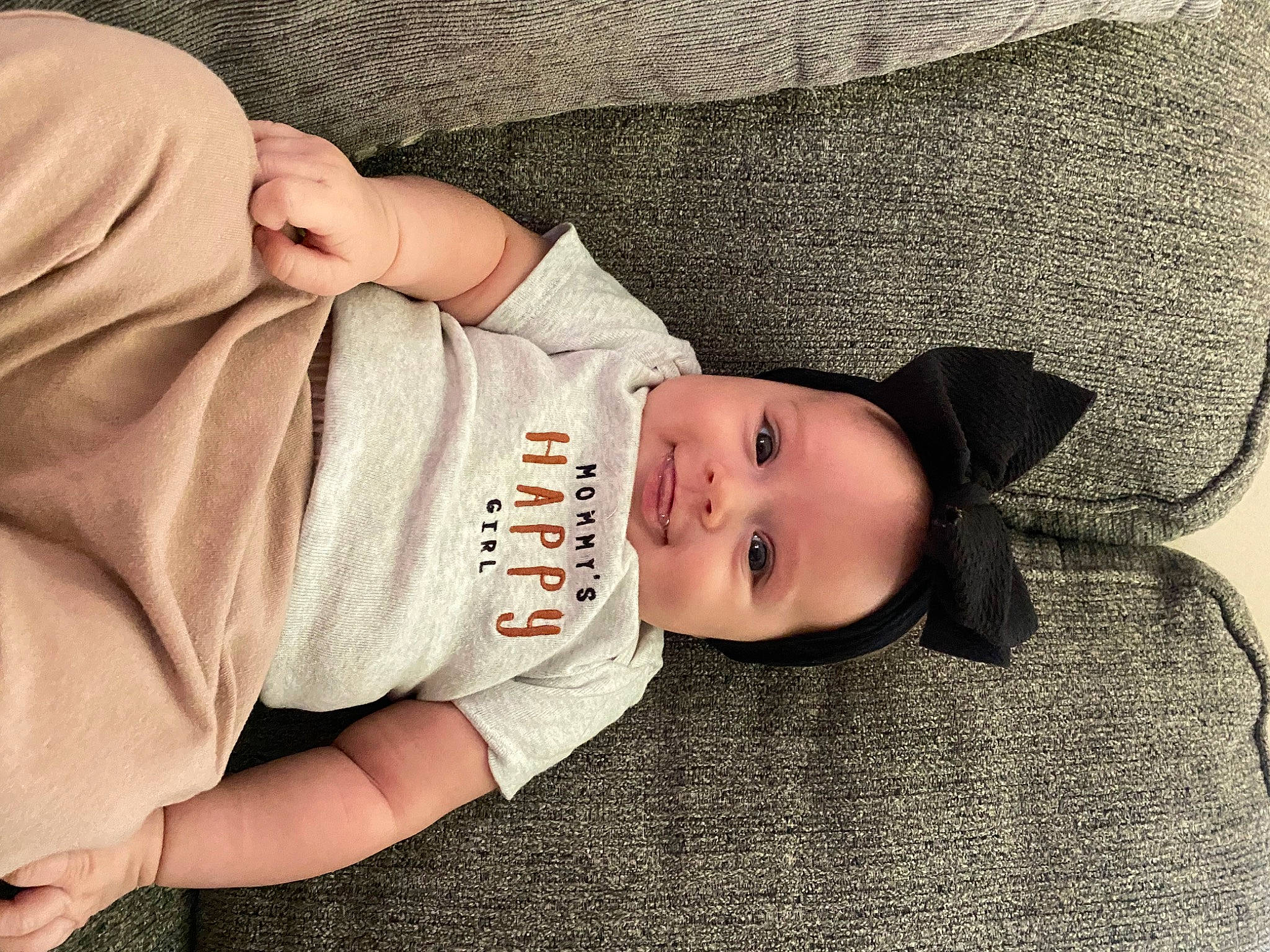 Aulani is registered to the contest to win money with this photo: baby, baby_products, baby_sleeping, baby_toddler_clothing, beauty, cheek, child, comfort, eye, face, hat, headgear, human_body, joy, lip, mammal, nose, person, skin, sleeve