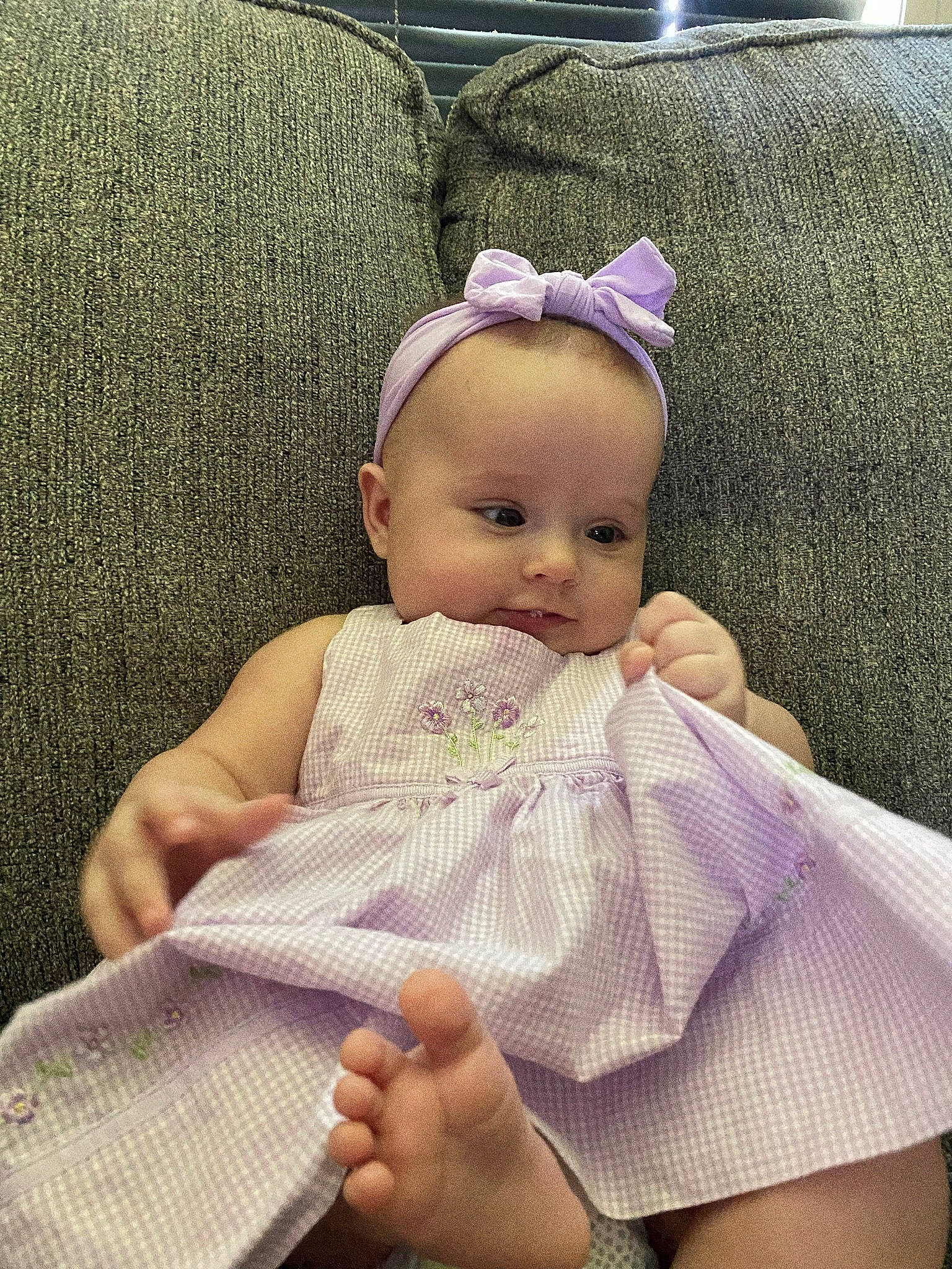 Aulani is registered to the contest to win money with this photo: baby, baby_sleeping, baby_toddler_clothing, cap, child, comfort, dress, eye, fashion_accessory, foot, happy, headband, headpiece, human_leg, iris, linens, person, skin, sleeve, thumb