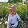 baby, child, pink_hat, daisies, flowers, grass, outdoor, nature, sunlight, greenery, barefoot, smiling, happy, sitting, field, spring, casual_clothing, cute, infant, playful