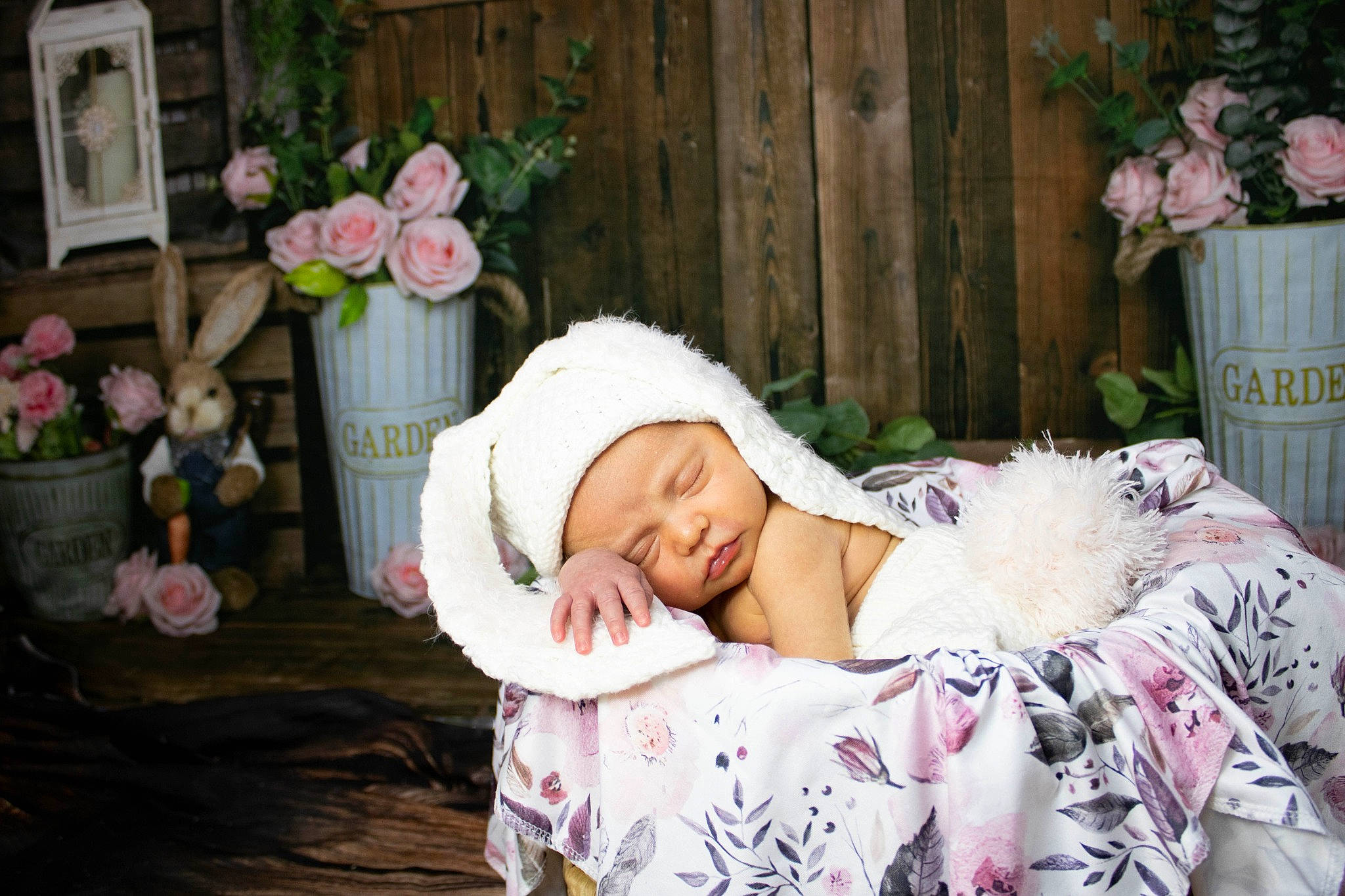 Delilah joined the competition — help win amazing prizes! baby, child, dress, event, fashion_accessory, floral_design, flower, flower_arranging, flowerpot, grass, hair_accessory, happy, hat, headpiece, headwear, person, petal, pink, plant, sitting