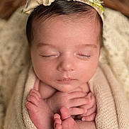 Ella participe au concours pour gagner de l'argent avec cette photo : newborn, baby, sleeping, wrapped, blanket, headband, flower, pearls, closeup, soft, peaceful, infant, skin, hands, feet, cozy, portrait, cute, knit, resting