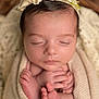 newborn, baby, sleeping, wrapped, blanket, headband, flower, pearls, closeup, soft, peaceful, infant, skin, hands, feet, cozy, portrait, cute, knit, resting