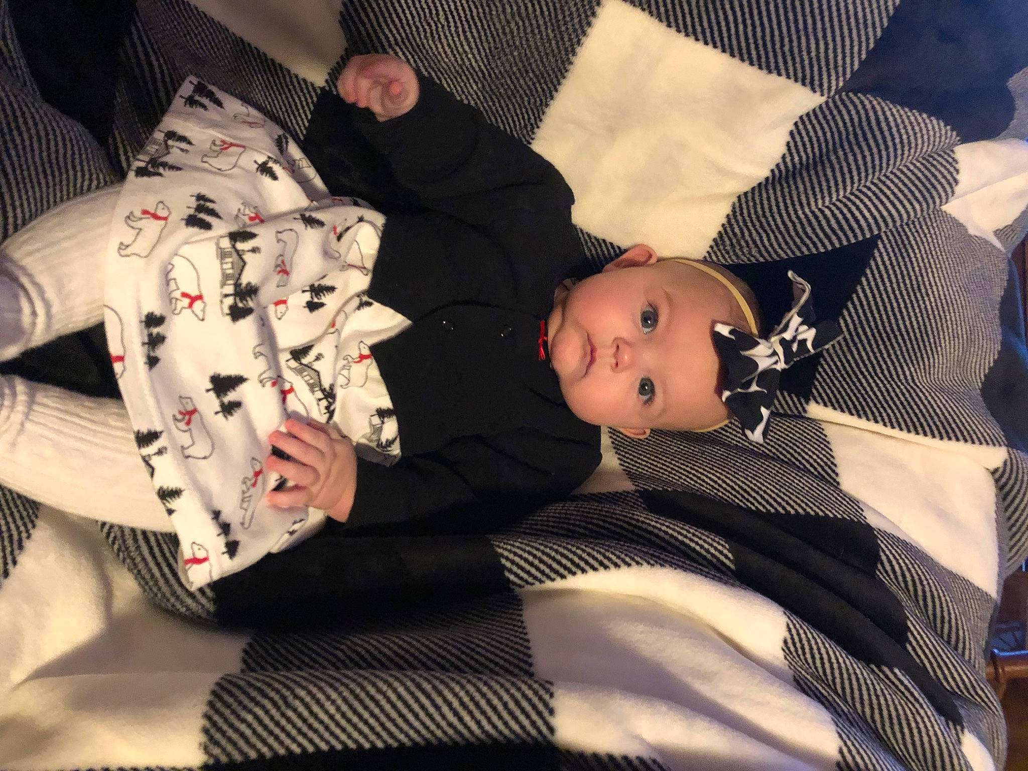 Aubrey is registered to the contest to win money with this photo: baby, baby_products, baby_toddler_clothing, carmine, child, comfort, headwear, lap, linens, mammal, pattern, person, product, room, sitting, sleeve, textile, toddler, tree, vertebrate